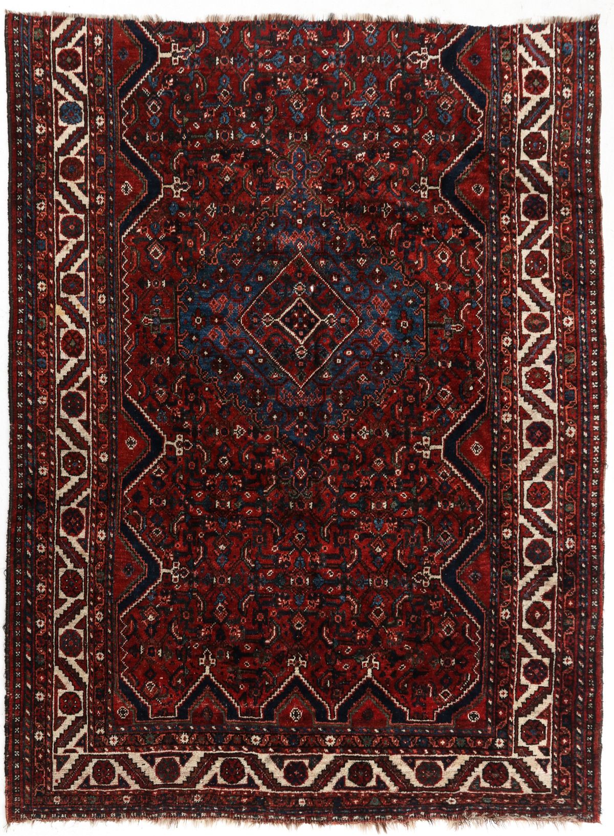 A SOUTHWEST PERSIAN RUG FRAGMENT