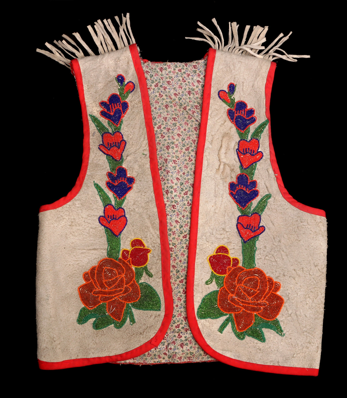 A LATE 20TH C. CHIPPEWA INDIAN BEADED CHILD'S VEST