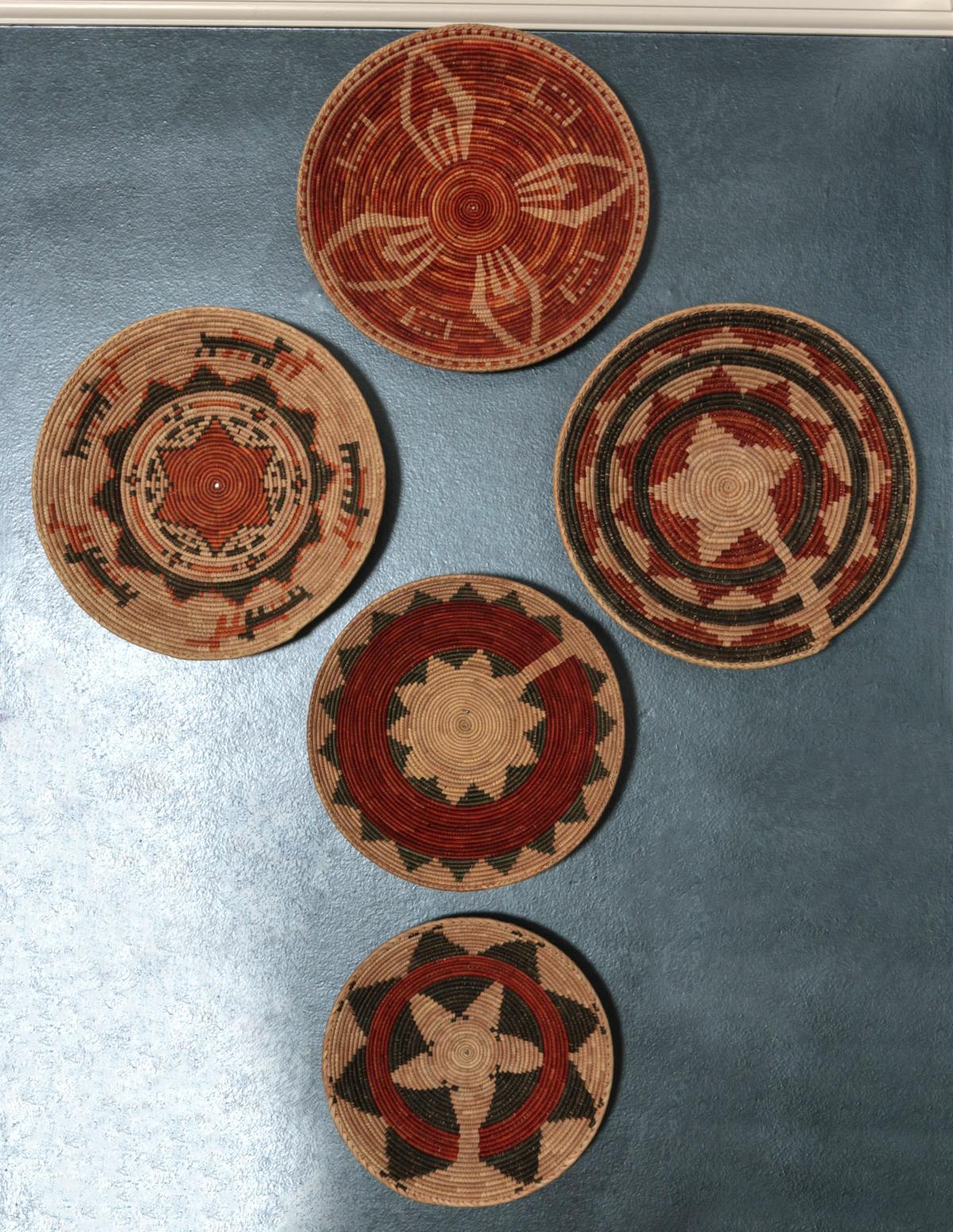A COLLECTION OF TEN SOUTH AMERICAN BASKETRY TRAYS