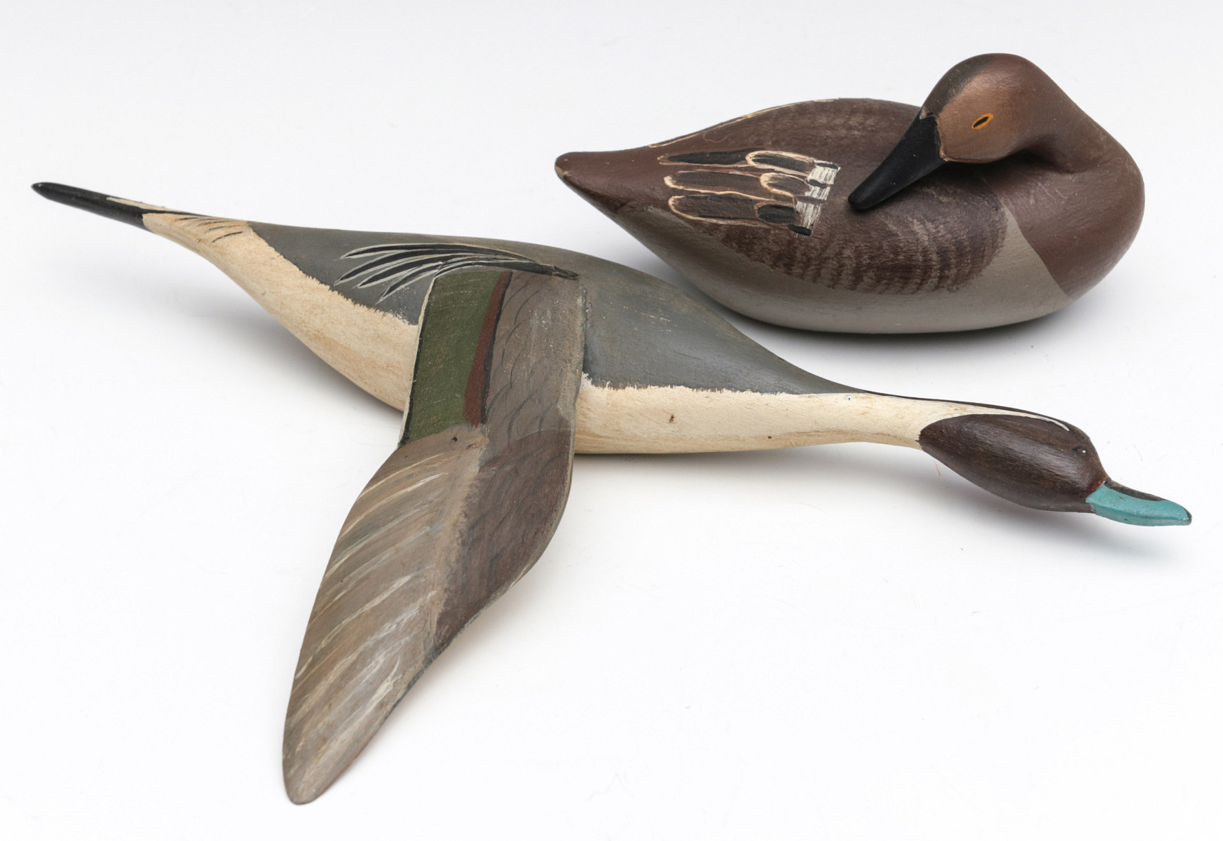 A 1948 CLARENCE BAUER MINIATURE CANVASBACK CARVING