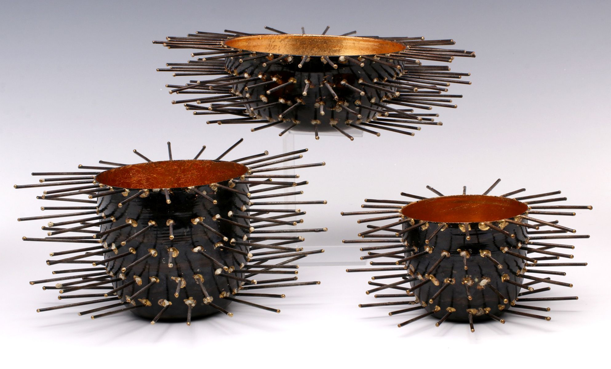 THREE SPINY DECORATIVE VOTIVES OR VESSELS