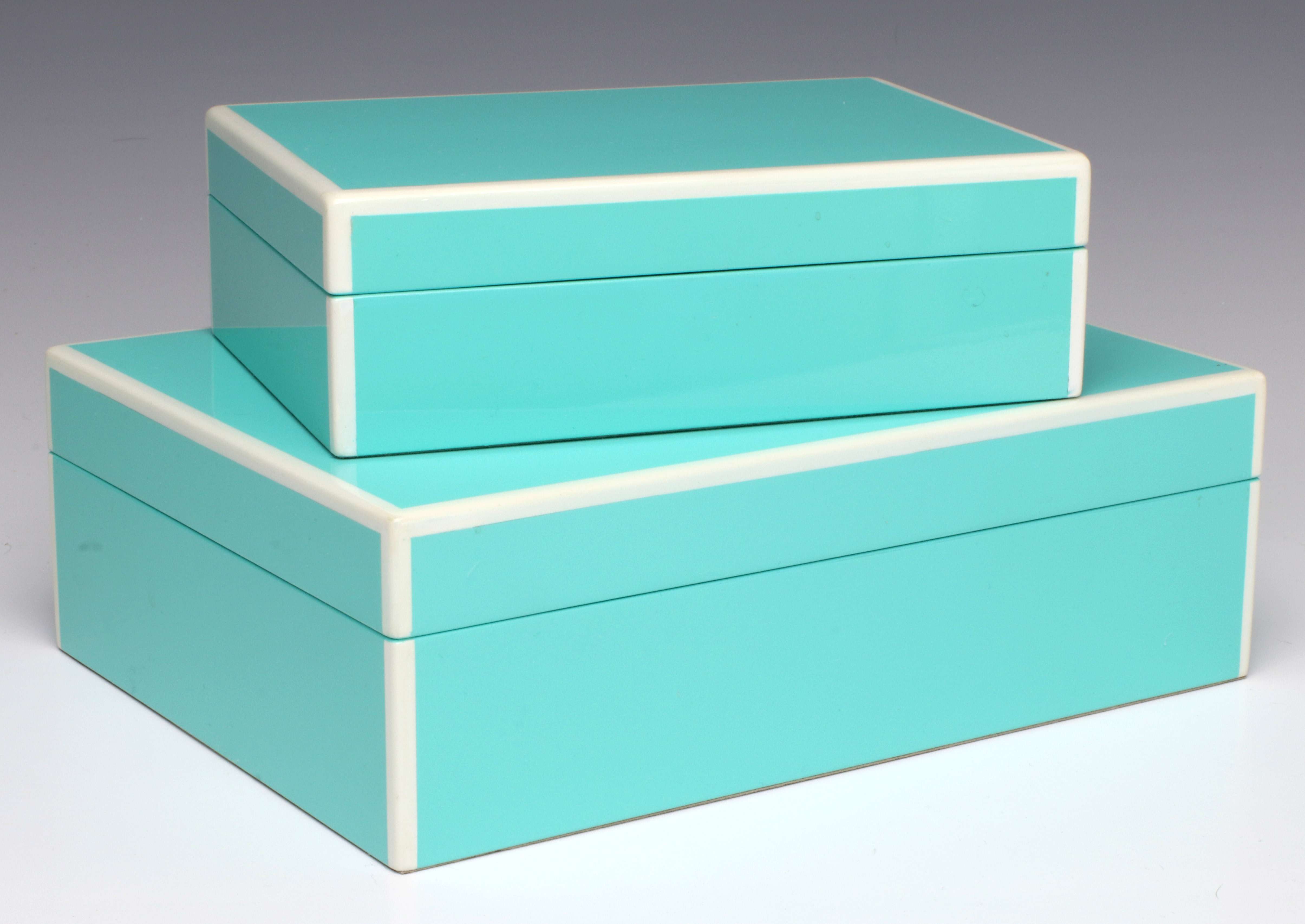 FOUR STYLISH CONTEMPORARY STORAGE BOXES