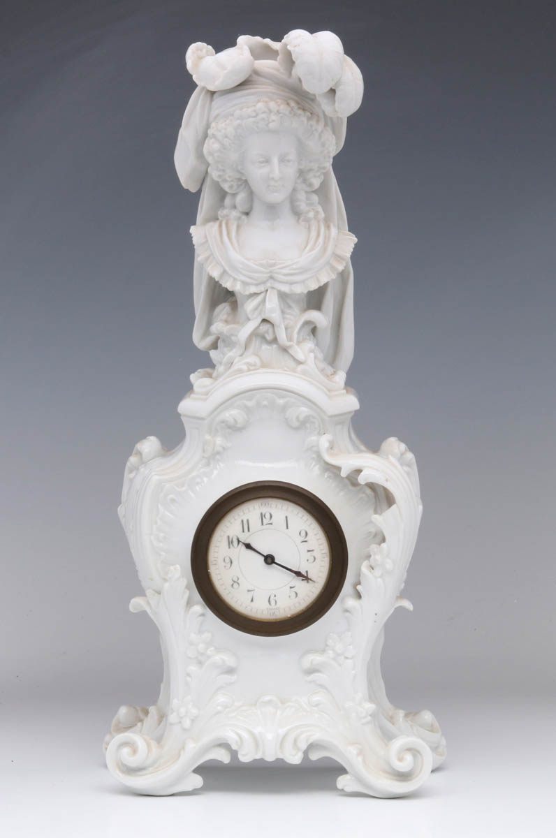 A FRENCH ROCOCO STYLE PORCELAIN CLOCK