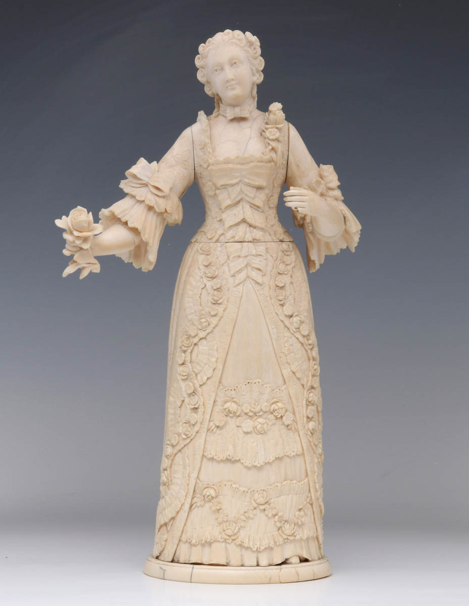 A 19TH CENTURY CONTINENTAL CARVED IVORY FIGURE