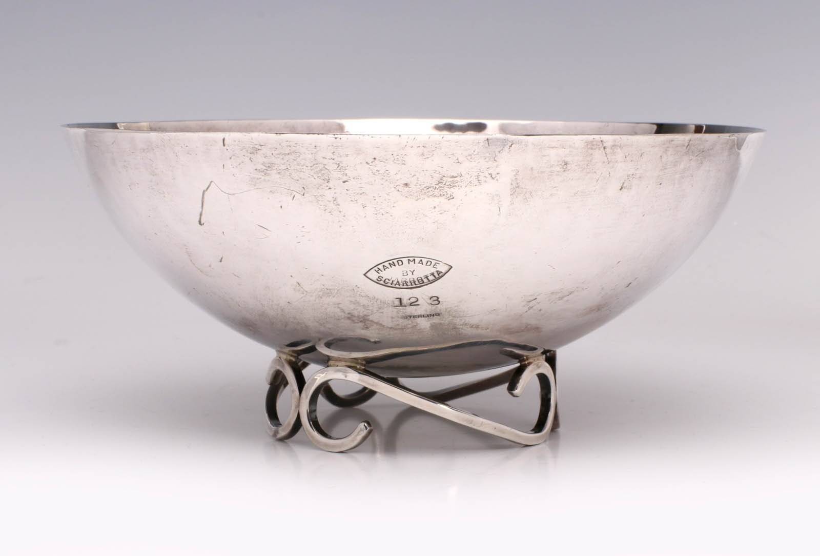 A HAND WROUGHT STERLING BOWL SIGNED SCIARROTTA