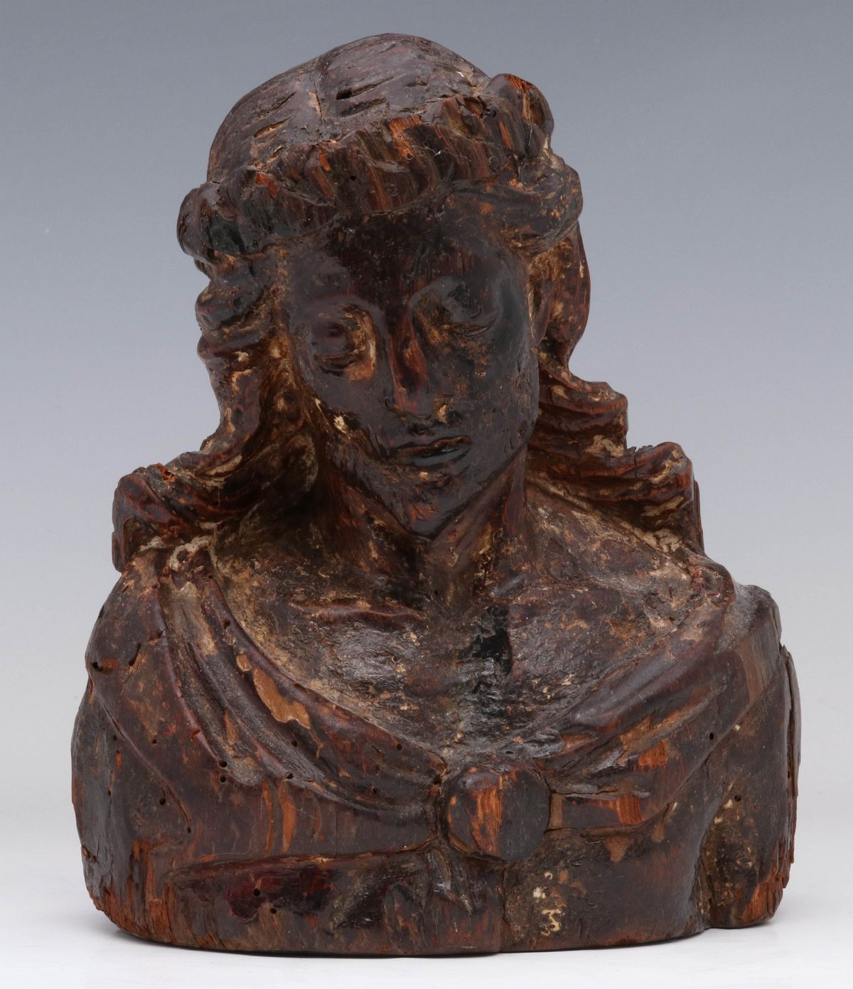 A 16TH / 17TH CENTURY CARVED WOOD BUST OF CHRIST