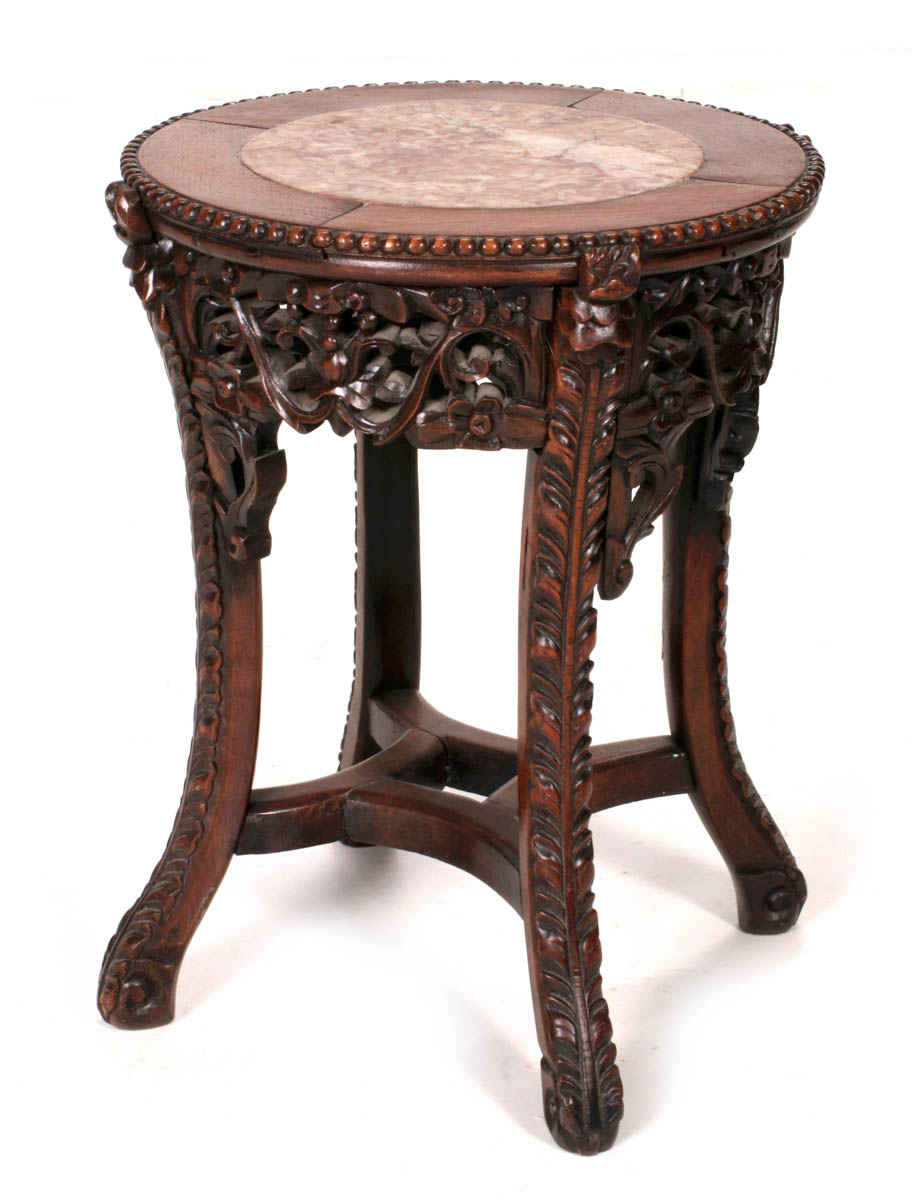 A 19TH CENTURY CHINESE CARVED TAMBOUR TABLE
