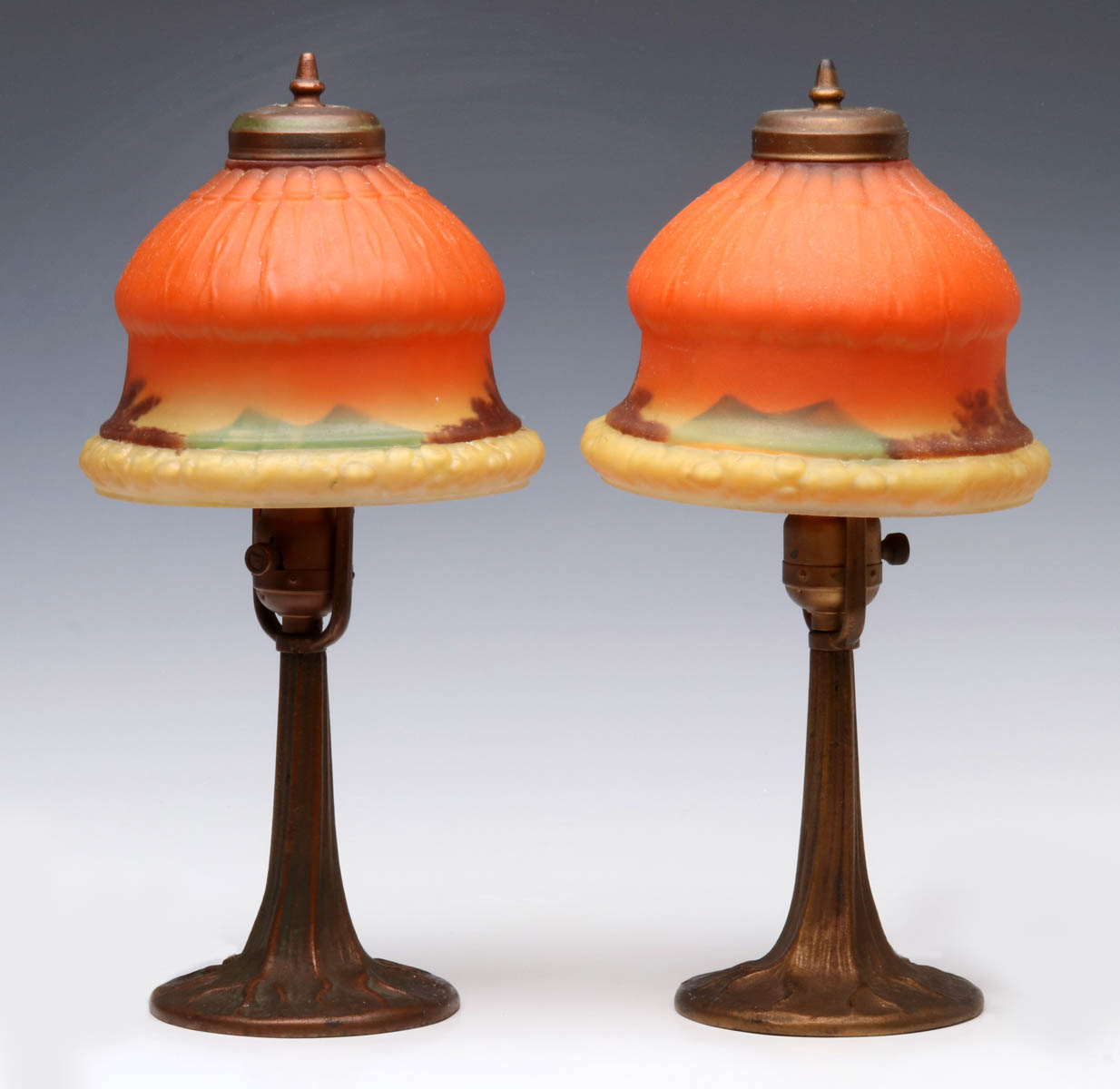 A PAIR BOUDOIR LAMPS WITH REVERSE PAINTED SHADES