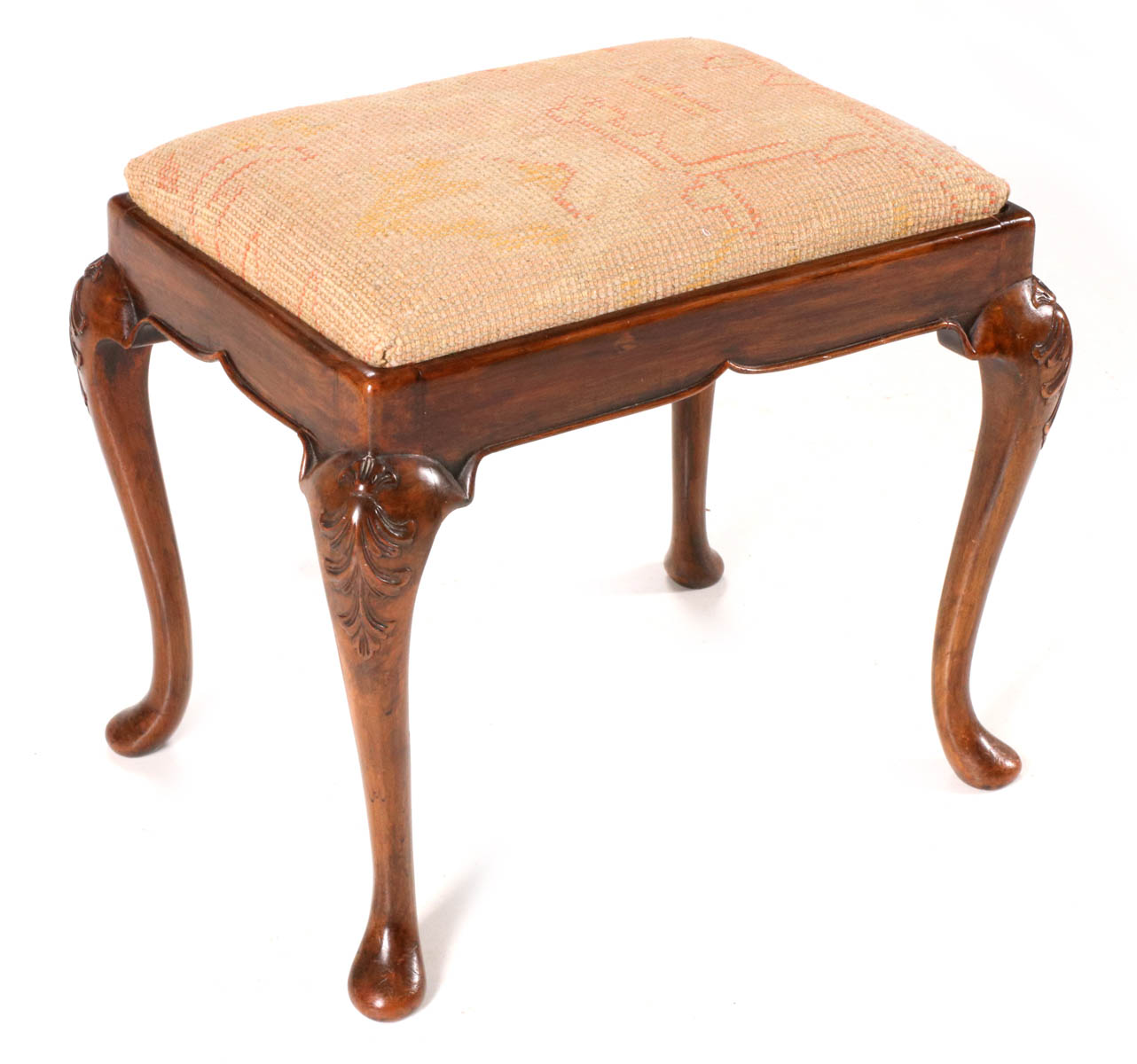 A GEORGIAN PAD FOOT STOOL WITH OUSHAK COVERING