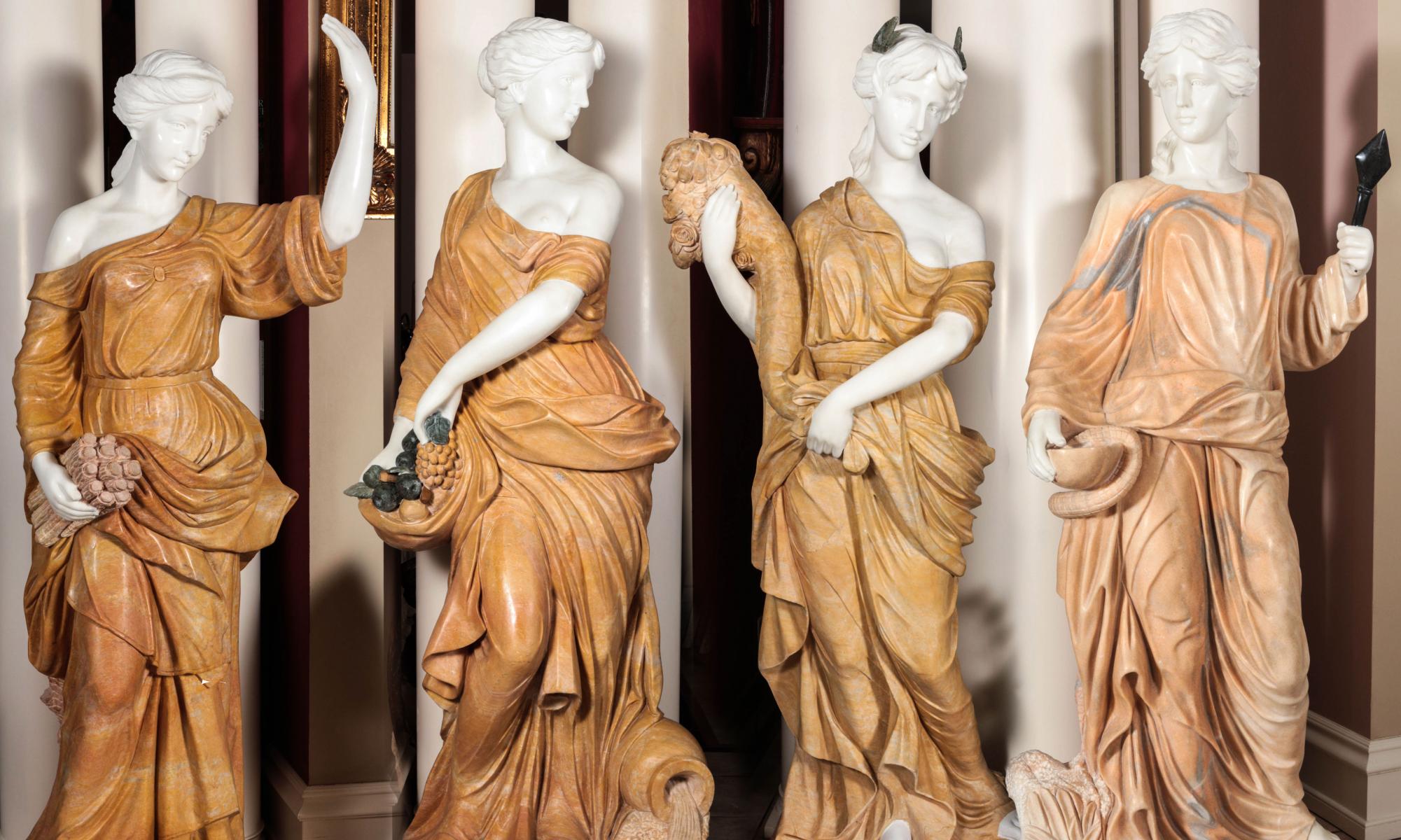 LIFE-SIZED MARBLE AND ONYX 'FOUR SEASONS' STATUES