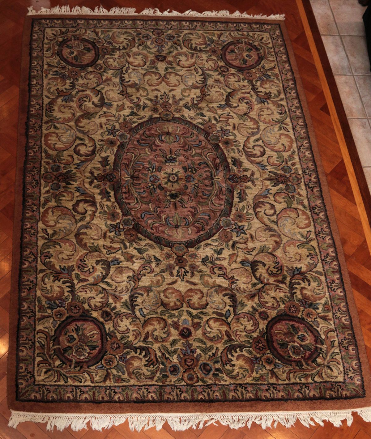 A PERSIAN STYLE AREA RUG