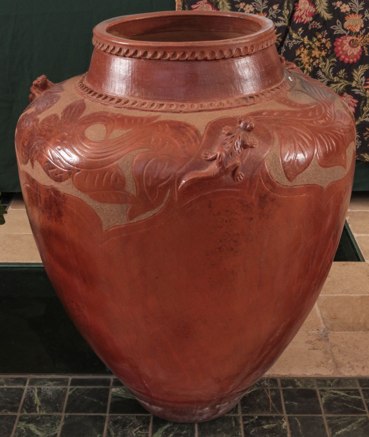 A LARGE MEXICAN CARVED REDWARE POTTERY VESSEL