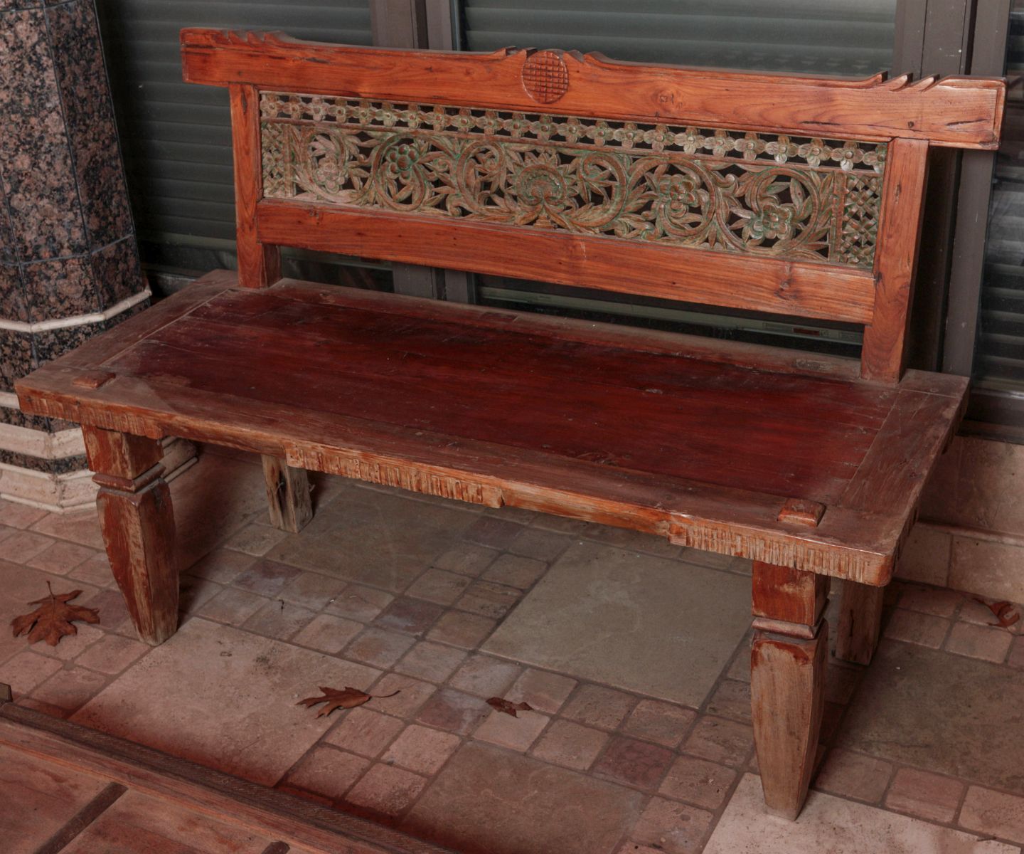 AN INTERESTING ASIAN CARVED TEAK WOOD BENCH