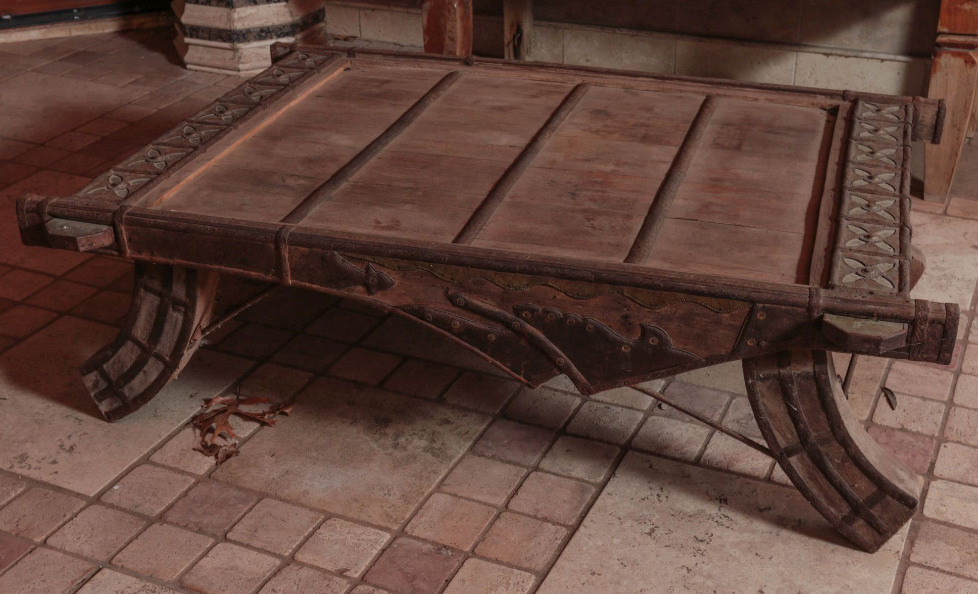 AN INTERESTING LOW ASIAN TABLE WITH IRON MOUNTS