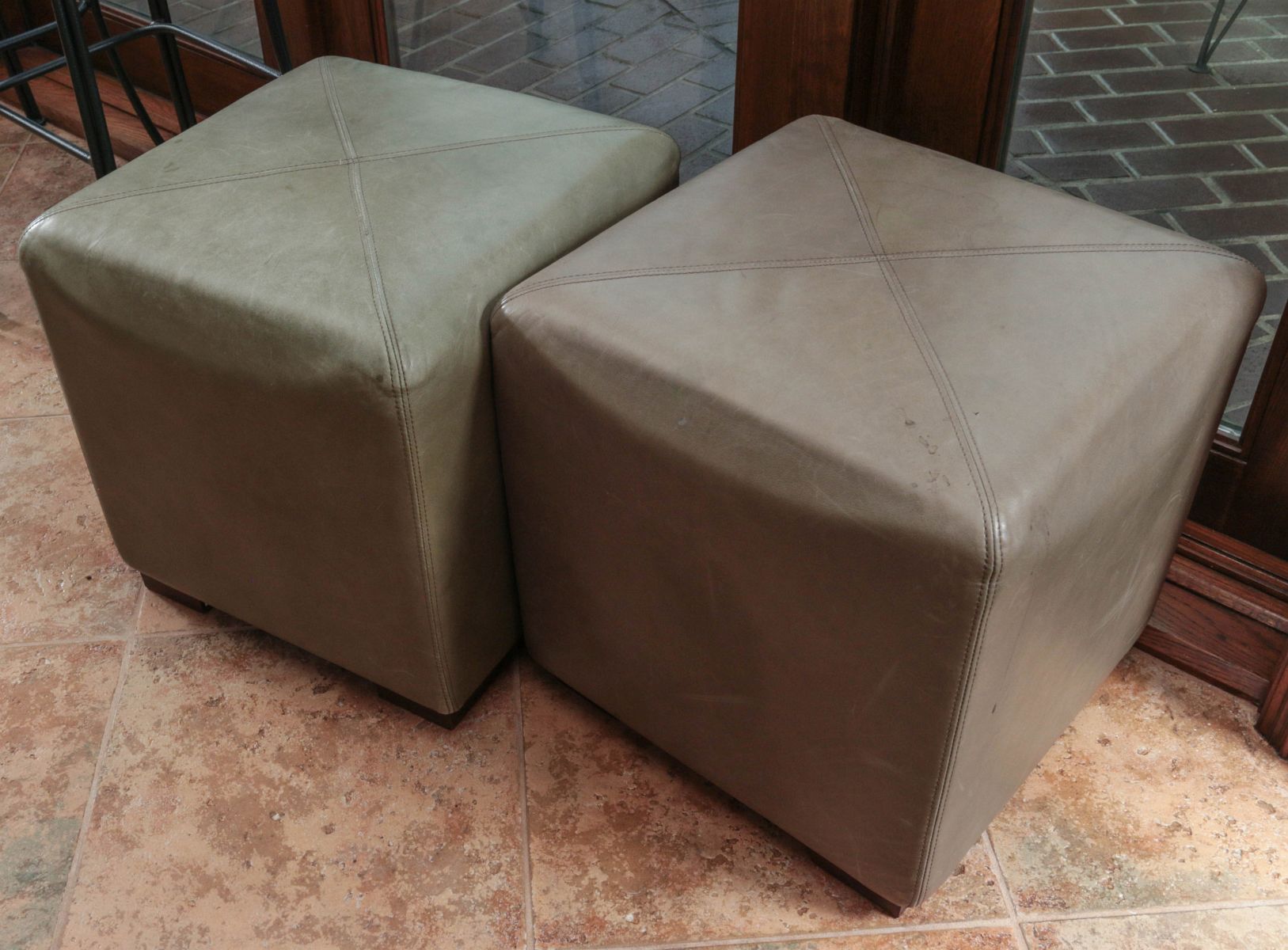 TWO CONTEMPORARY LEATHER OTTOMANS