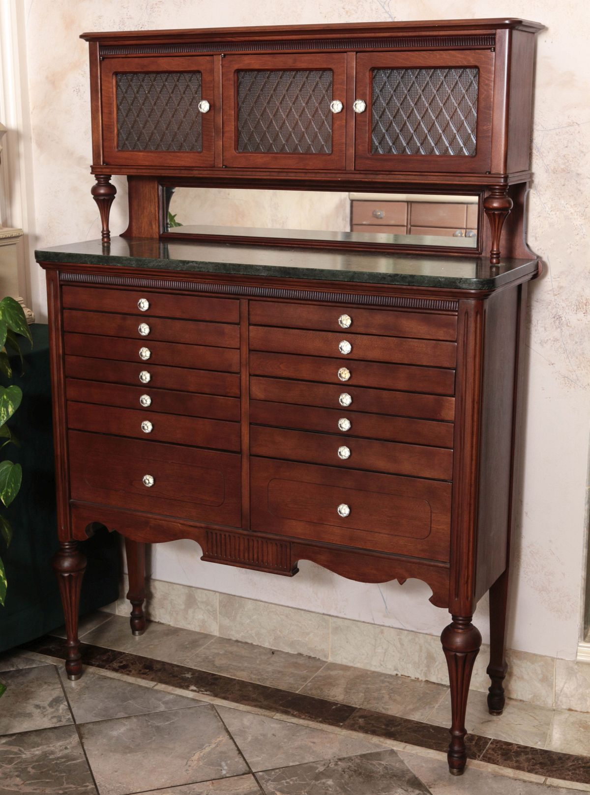A VINTAGE DENTAL CABINET WITH FOURTEEN DRAWERS