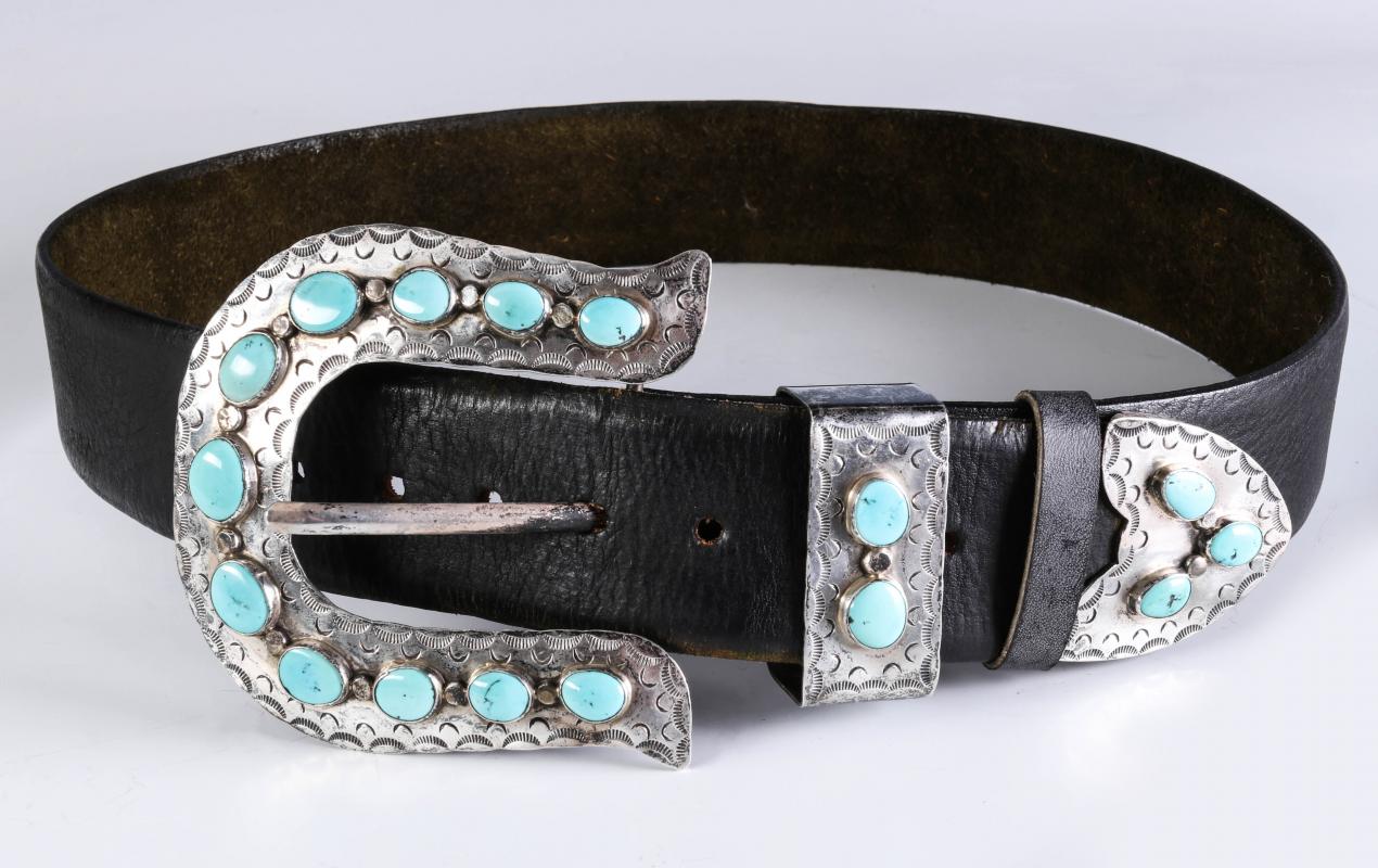 A NAVAJO STERLING AND LEATHER BELT WITH TURQUOISE