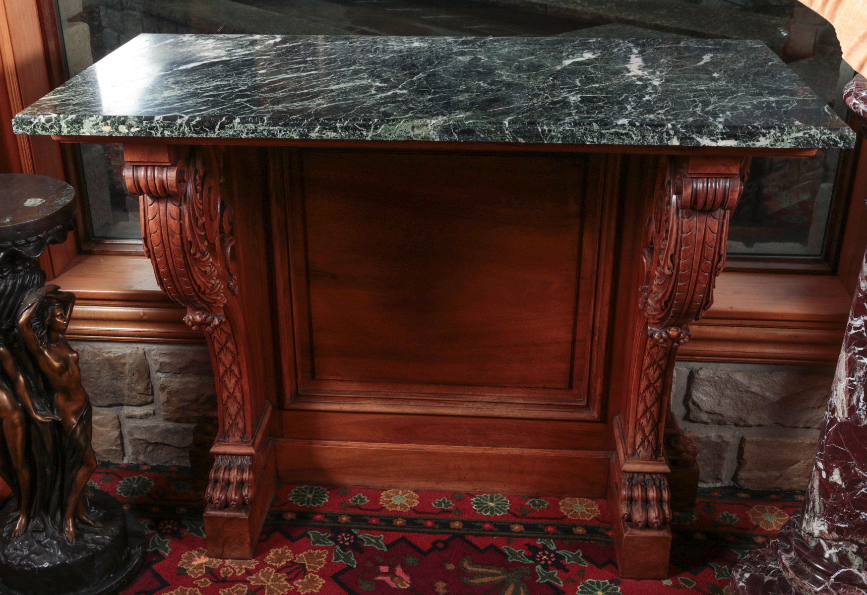 A HANDSOME CARVED MAHOGANY CONSOLE WITH MARBLE TOP