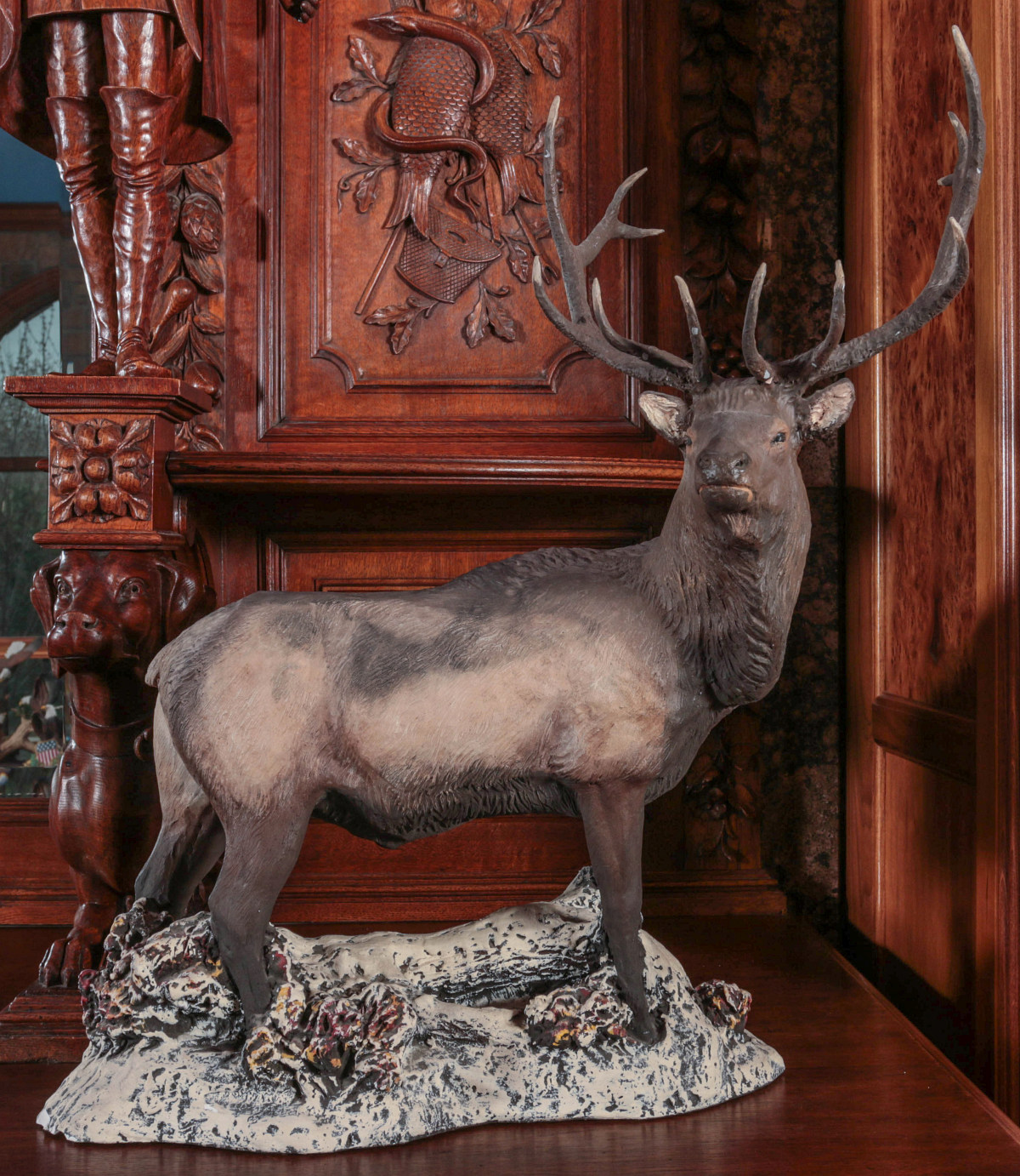 A LATE 20TH CENT MOLDED SCULPTURE OF AN ELK