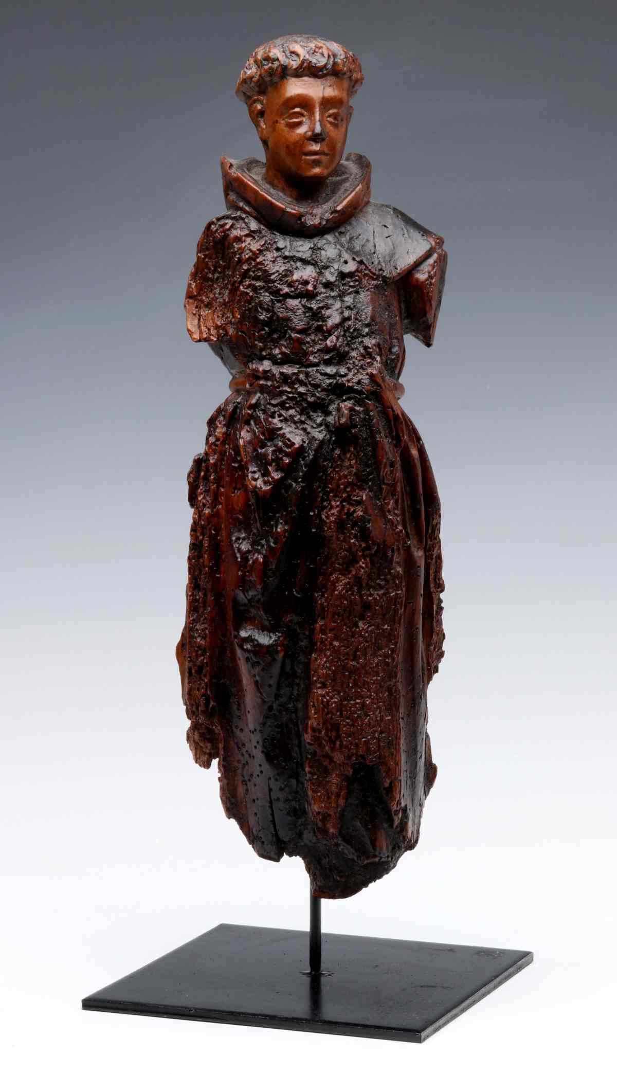 A 17TH CENTURY FLEMISH CARVED WOOD FIGURE OF MONK