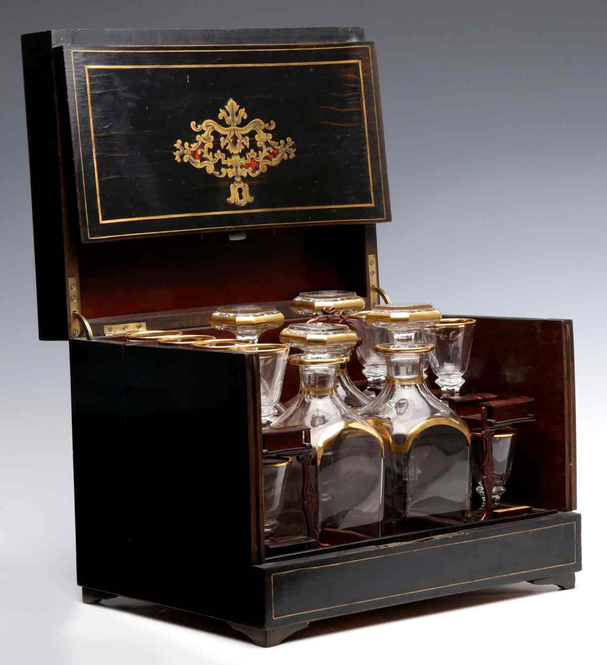 A NAPOLEON III TANTALUS WITH BOULLE WORK INLAY