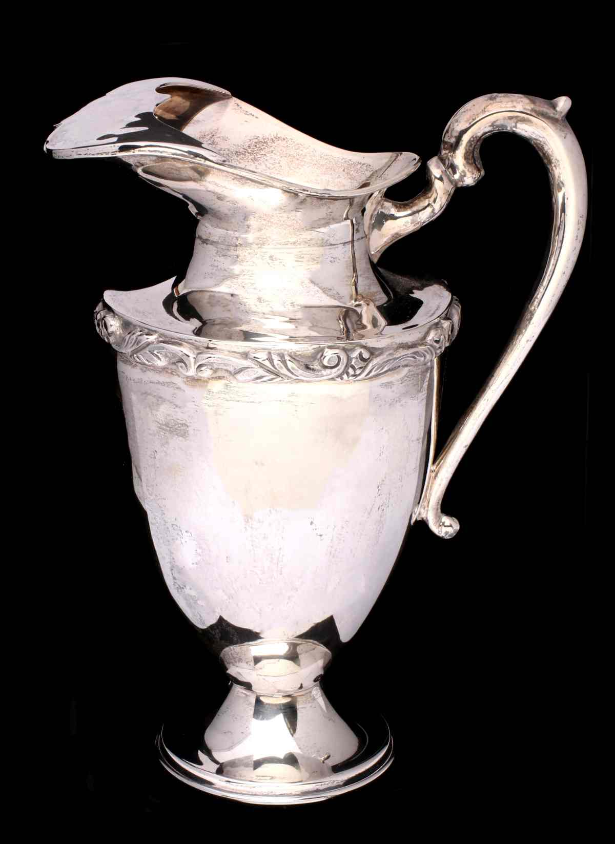 A MEXICAN STERLING SILVER WATER PITCHER