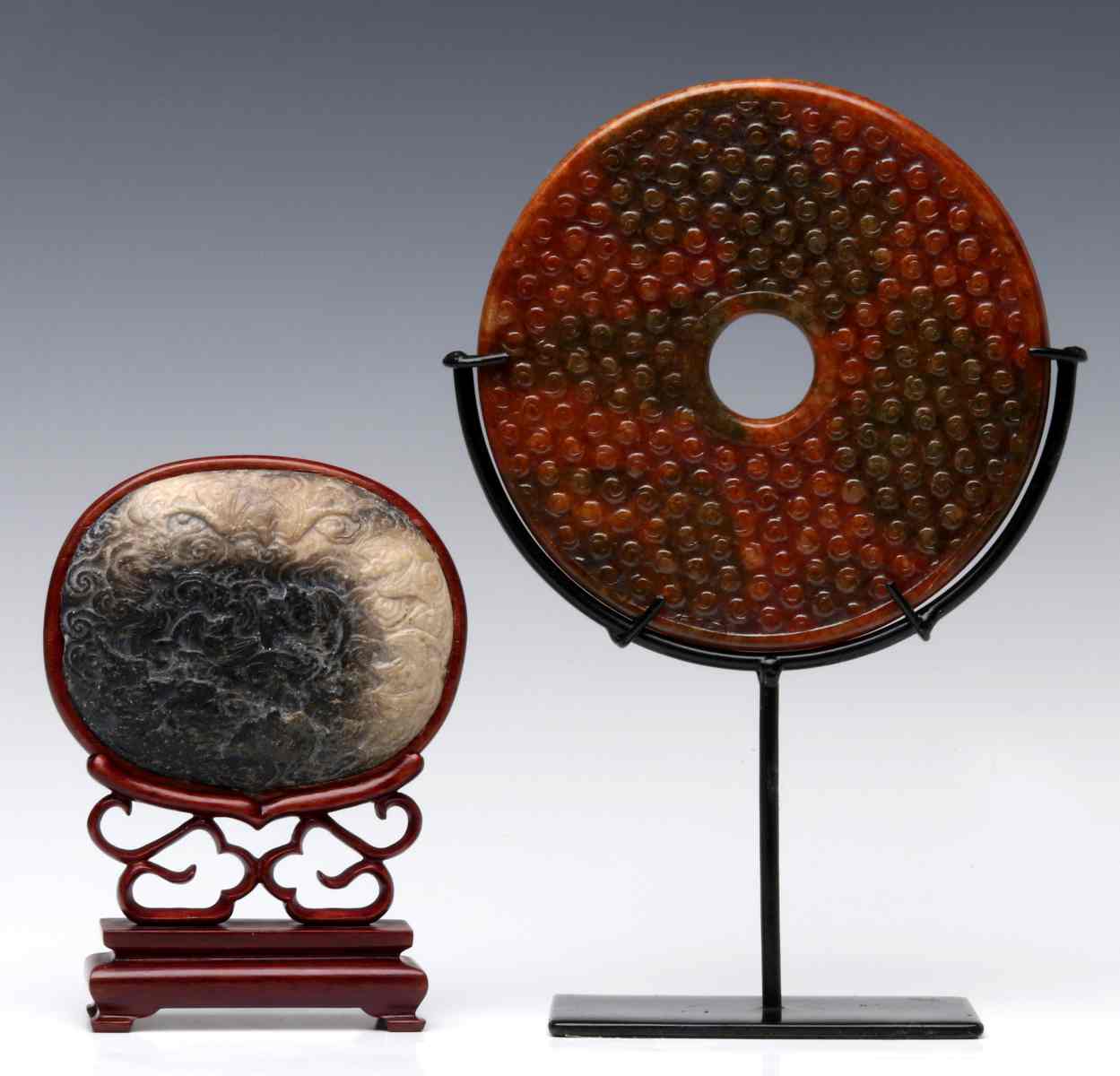 A CHINESE BI DISK WITH CARVED HARDSTONE PLAQUE