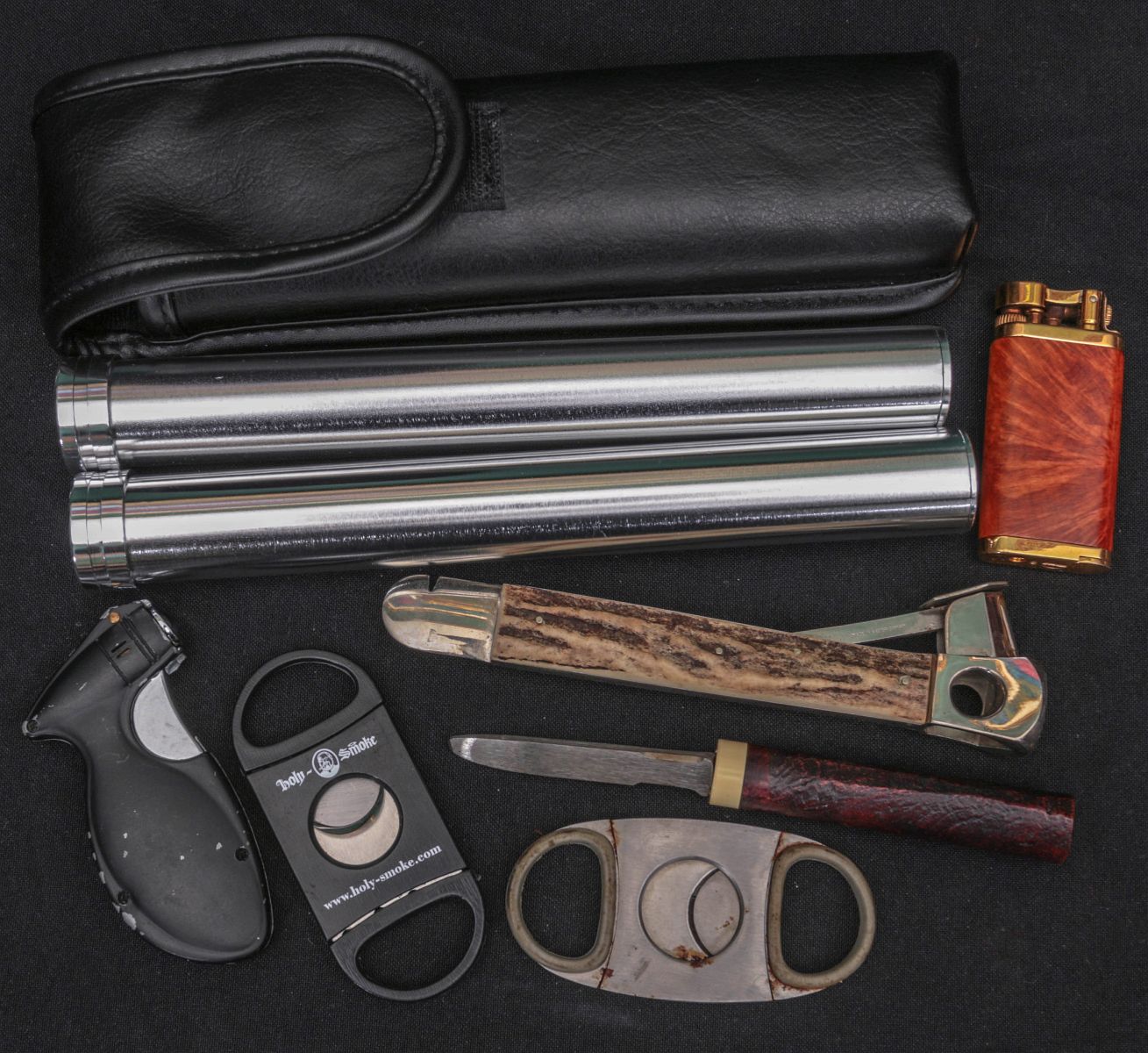 A GROUP OF TOBACCO SMOKING ACCESSORIES
