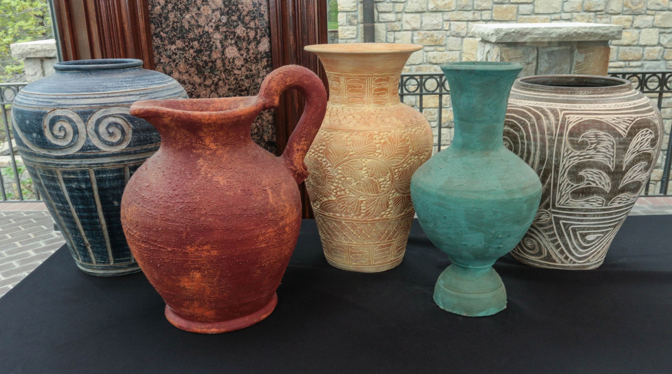 A COLLECTION OF ETHNIC POTTERY VESSELS
