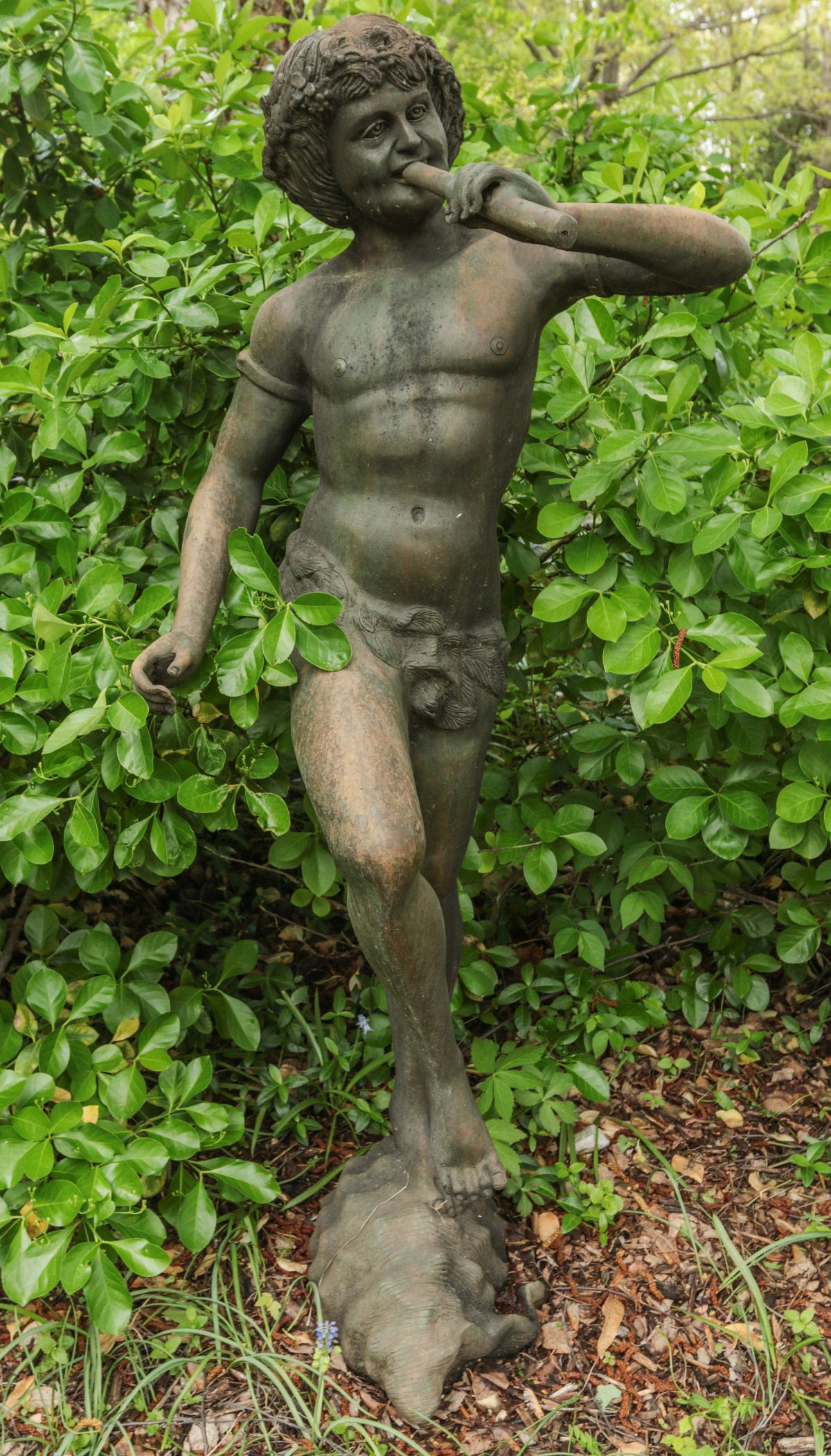 A CONTEMPORARY 52-INCH BRONZE PAN-LIKE FIGURE