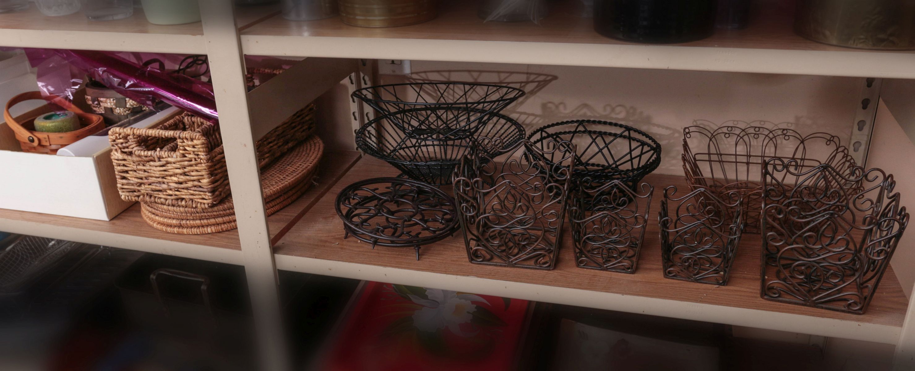 SHELF OF MISCELLANEOUS WIRE WARE HOLDERS