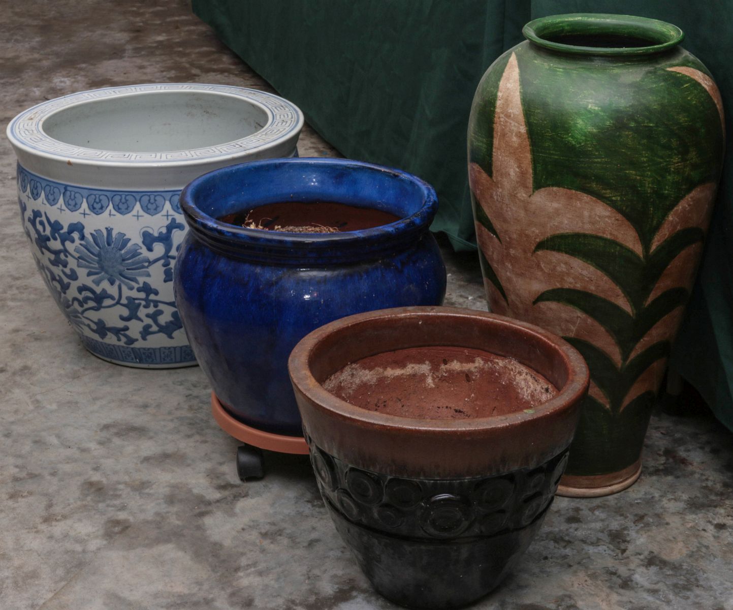 A GROUPING OF VARIOUS POTTERY PLANTERS