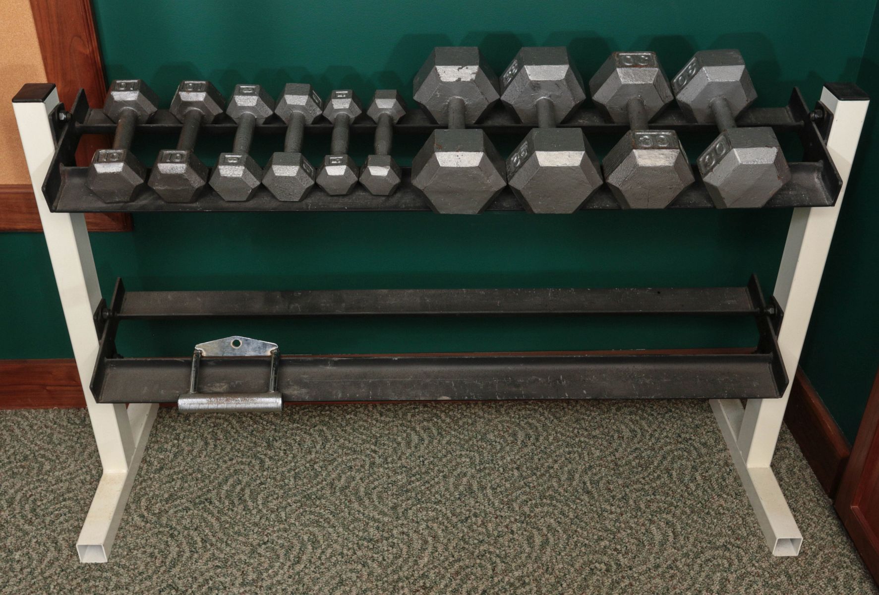 A DUMBBELL WEIGHT SET WITH RACK