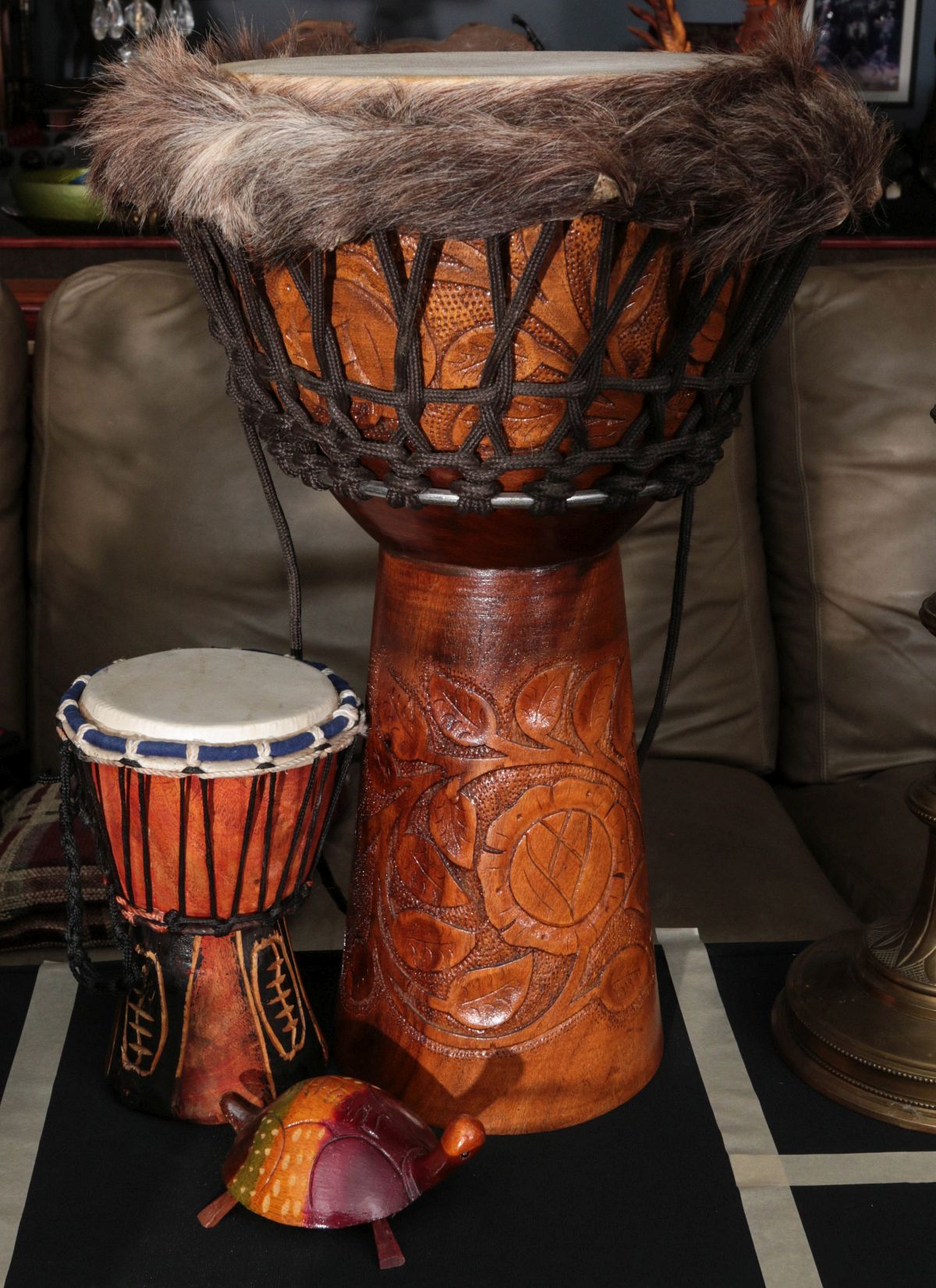 DECORATIVE ETHNIC DRUMS AND BRASS GONG