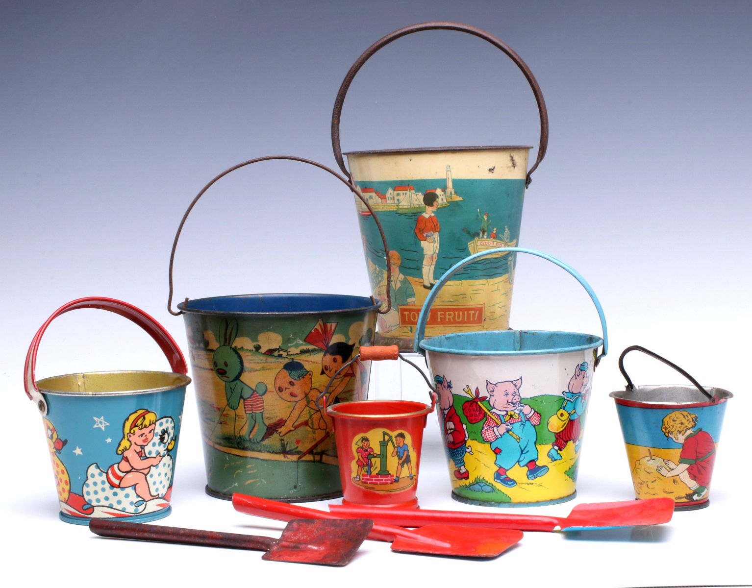 A COLLECTION OF SIX GOOD TIN LITHO SAND PAILS