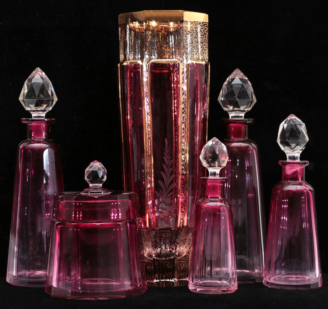 A GROUP OF CUT & POLISHED BOHEMIAN CRANBERRY GLASS