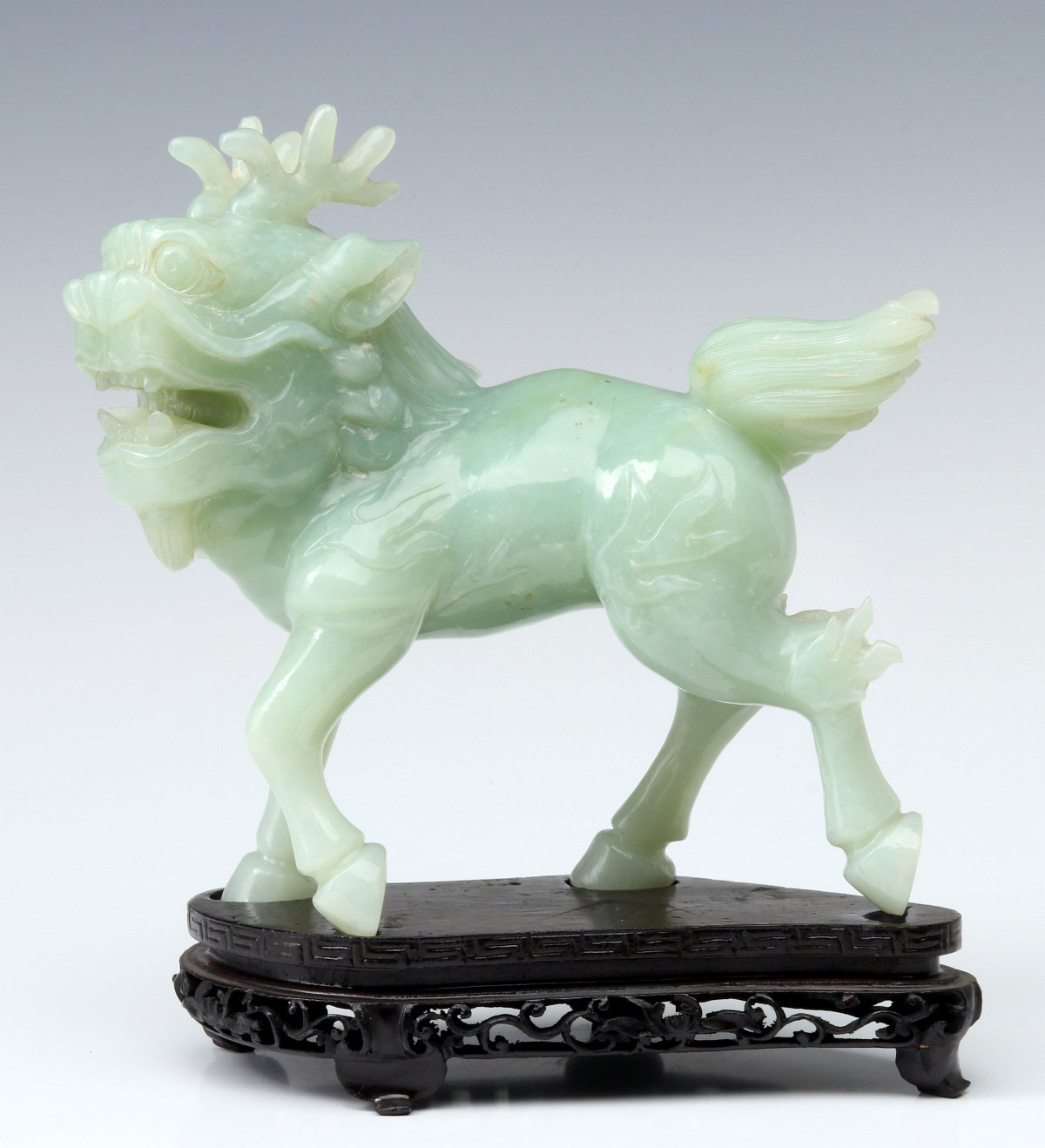 A CHINESE CARVED JADE FIGURE OF MYTHICAL HORSE DRAGON