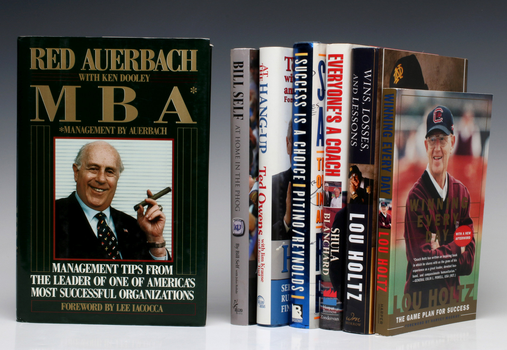 A COLLECTION OF AUTHOR-SIGNED SPORTS-RELATED BOOKS