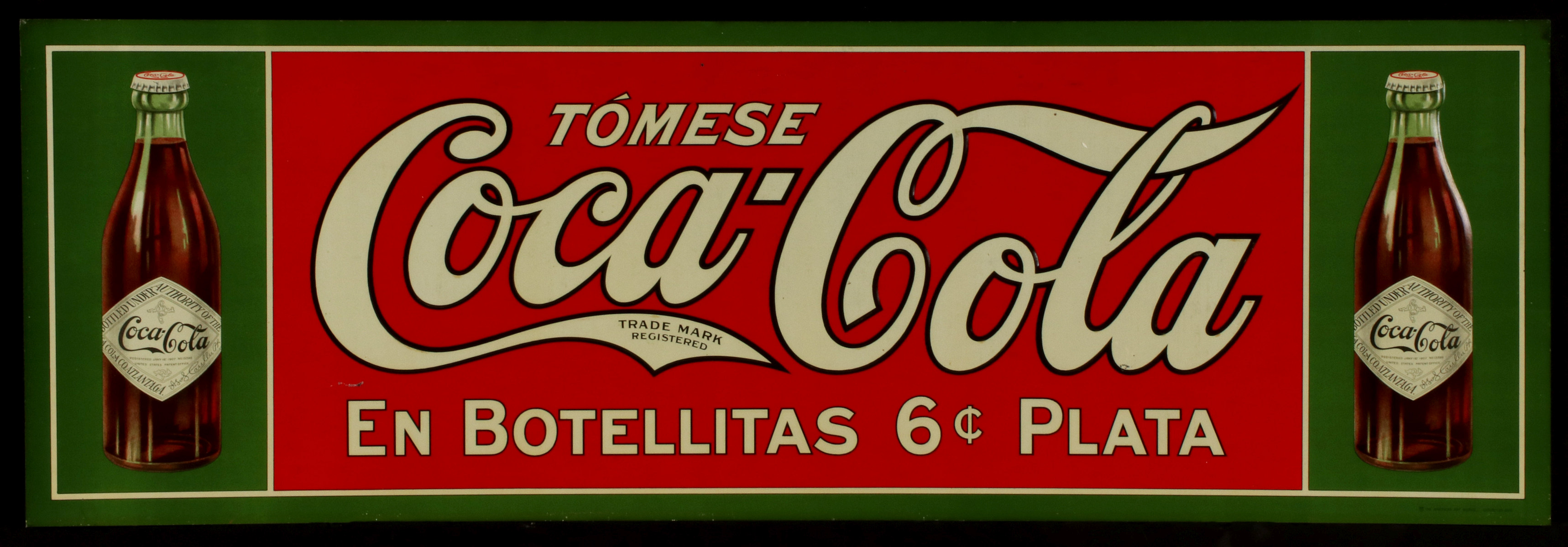 A 1908 6-CENT COCA COLA ADVERTISING SIGN IN SPANISH