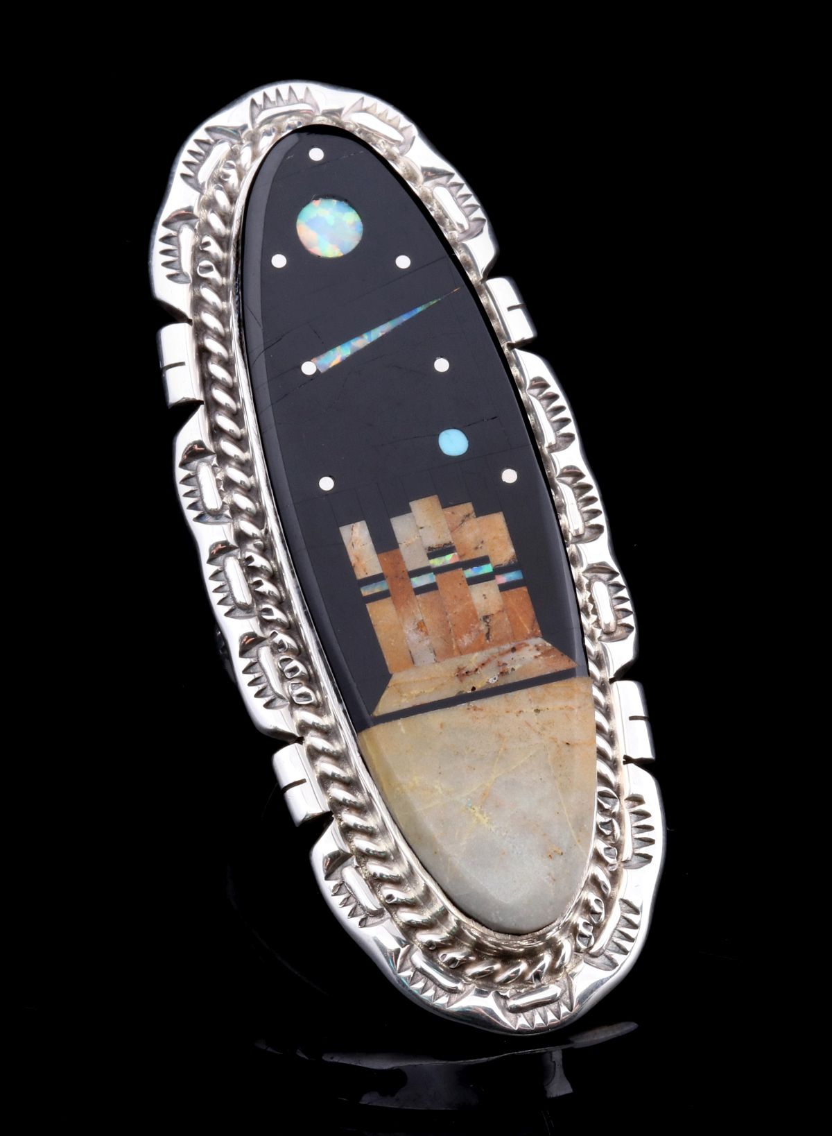 A STERLING SILVER NAVAJO INLAID 'NIGHT SKY' RING