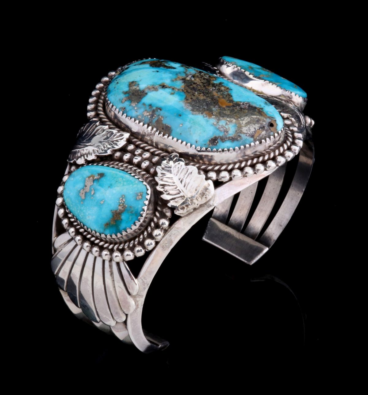 A LARGE NAVAJO STERLING SILVER MORENCI TURQUOISE CUFF