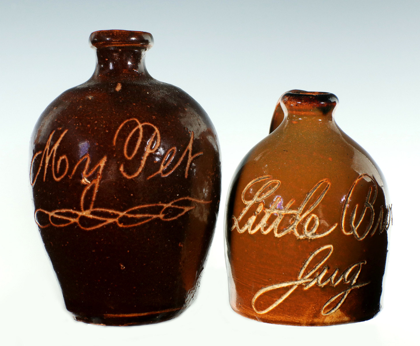 TWO 19TH CENTURY LUNCH HOUR WHIMSEY SCRATCH JUGS