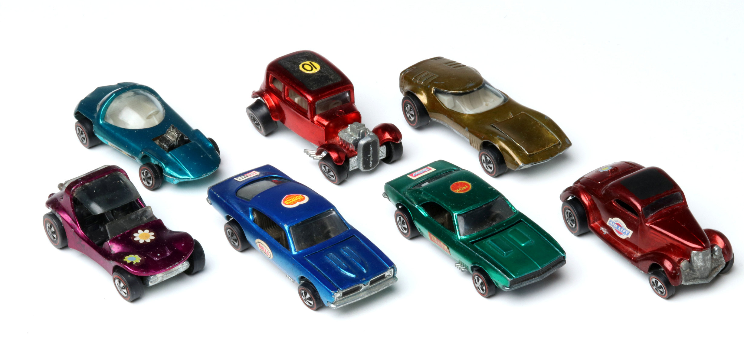 A COLLECTION OF SEVEN ORIGINAL VINTAGE HOT WHEELS CARS