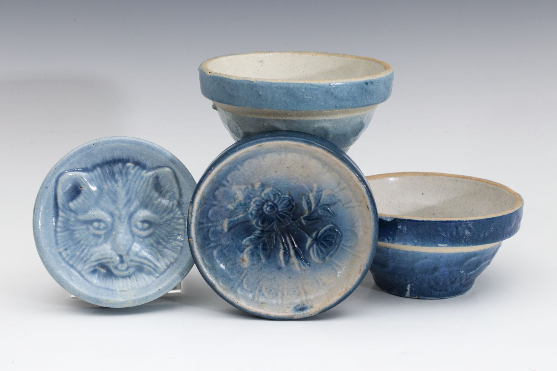 A COLLECTION OF BLUE AND WHITE STONEWARE NOVELTIES