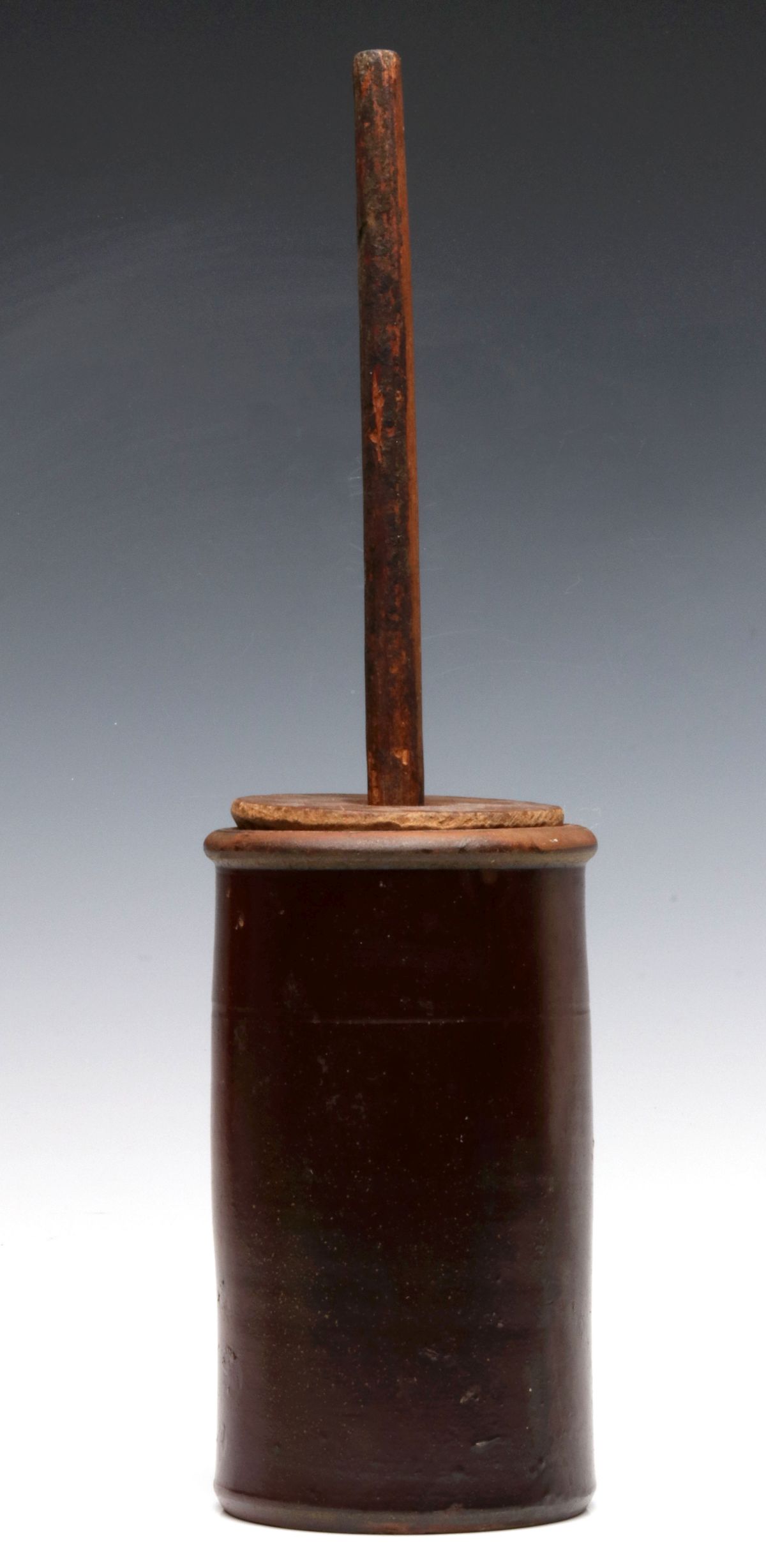 A 10-INCH 19TH CENTURY STONEWARE CHURN WITH DASHER