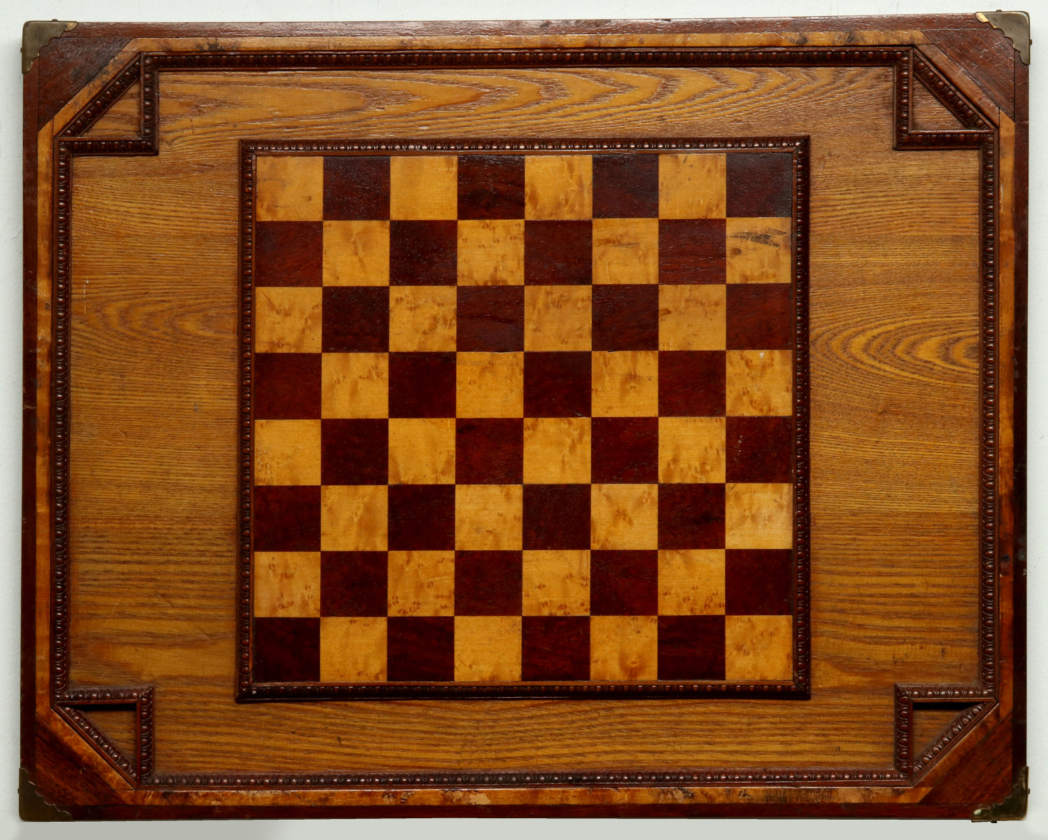 A HAND MADE GAME BOARD WITH FINE INLAY OF EXOTIC WOODS