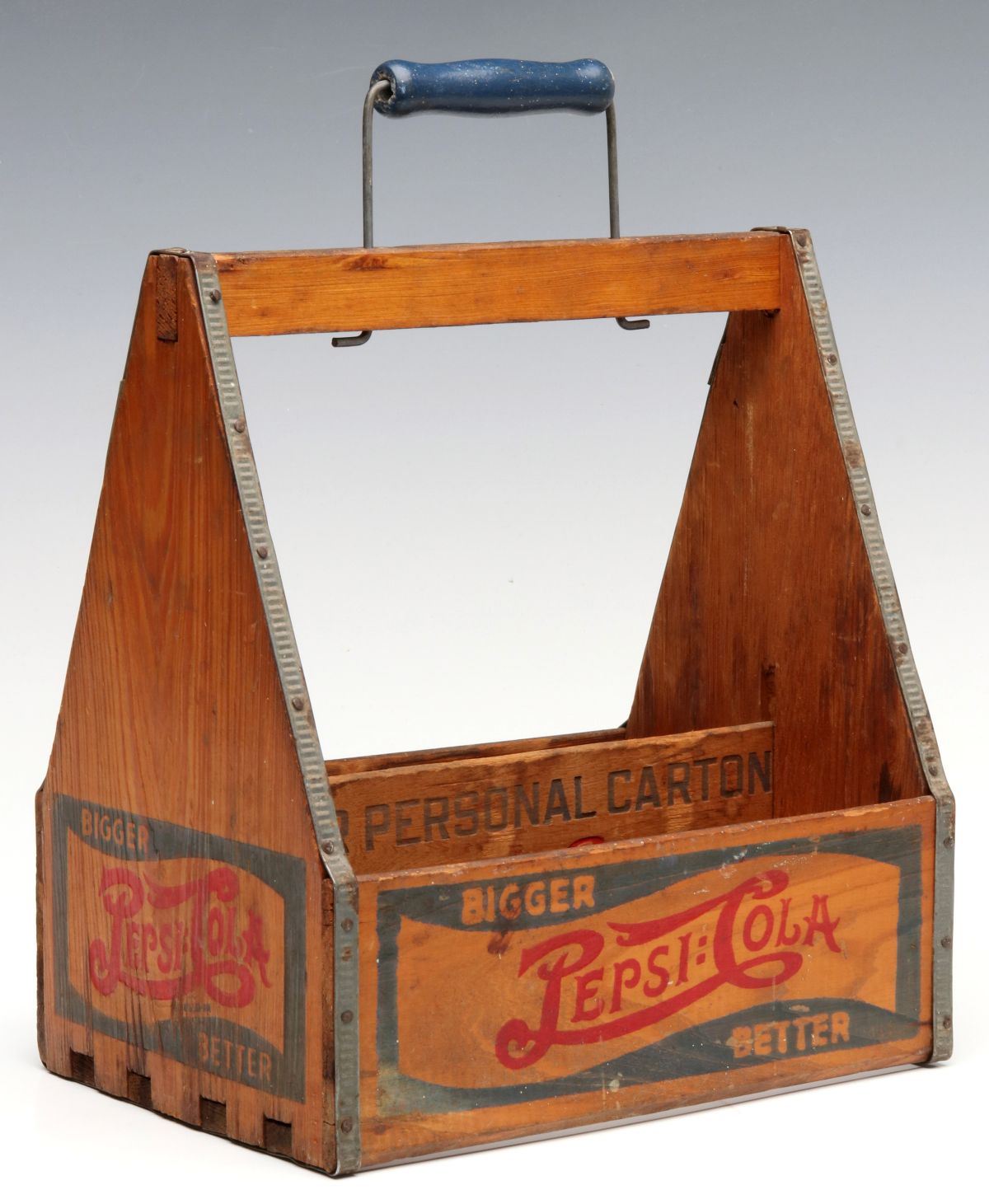 A PAIR OF PEPSI-COLA WOODEN BOTTLE CARRIERS CIRCA 1940s
