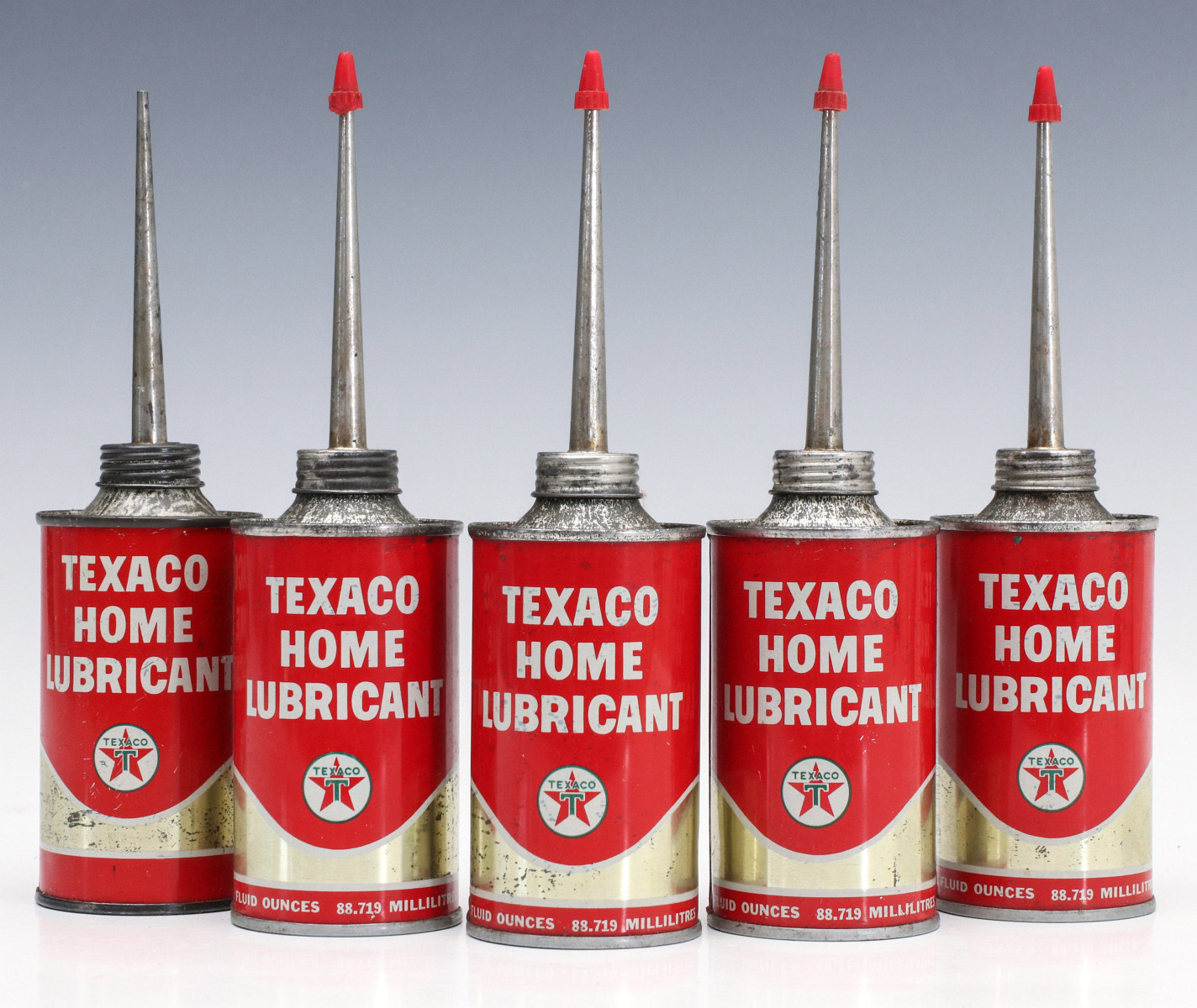 FIVE VINTAGE OILERS ADVERTISING TEXACO HOME LUBRICANT