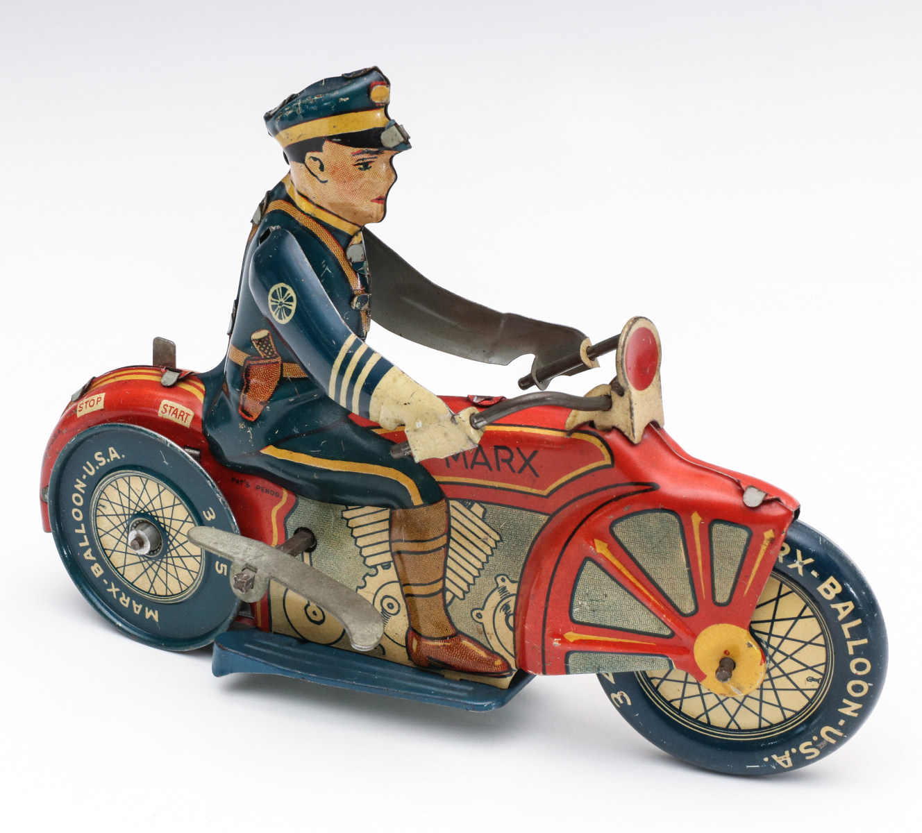A LOUIS MARX BALLOON TIRE 'ROOKIE COP' TOY MOTORCYCLE