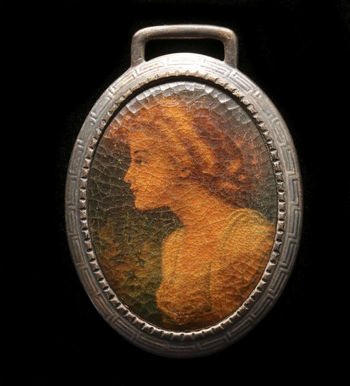 AN ADVERTISING WATCH FOB FOR THE WHITEHEAD HOAG COMPANY